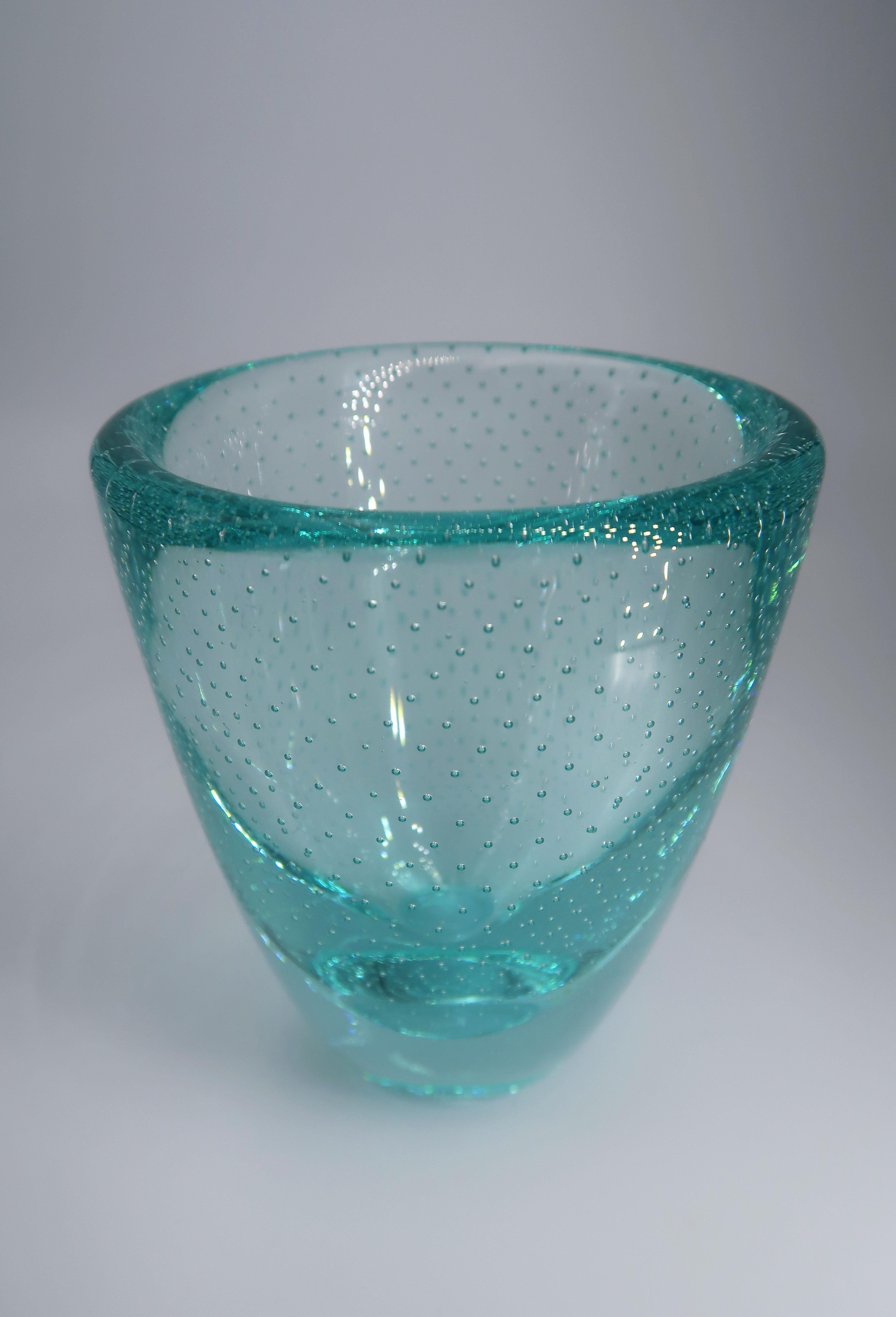 Beautiful midcentury smooth art glass decorative bowl with small, organic underwater like bubbles. 1960s Nordic modern piece in thick and solid aqua green glass. Beautiful vintage condition with small signs of wear - see photos. No chips or cracks.
