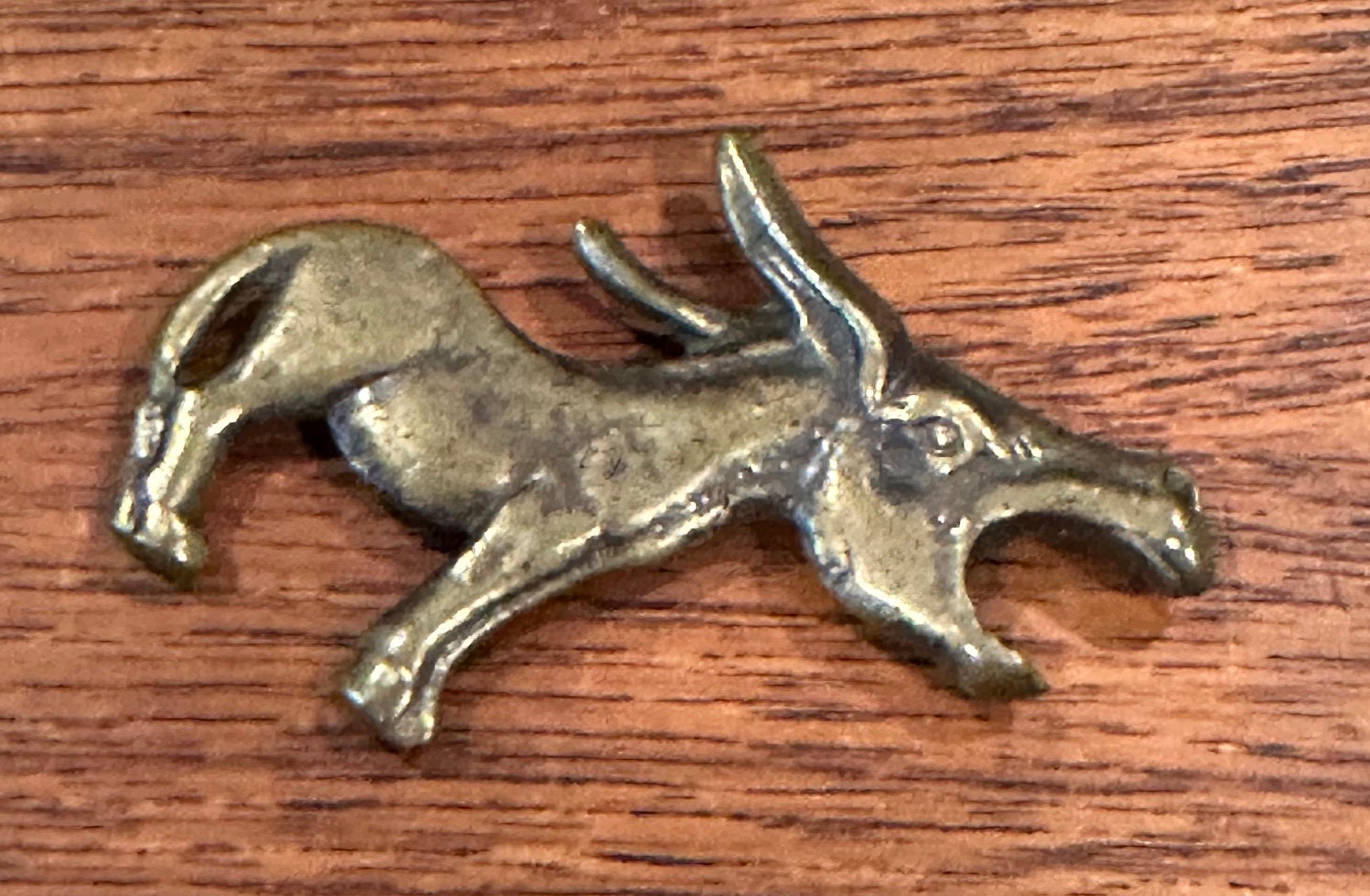 Small vintage brass donkey bottle opener, circa 1950's.  The piece is in good vintage condition with a great patina and measures 3
