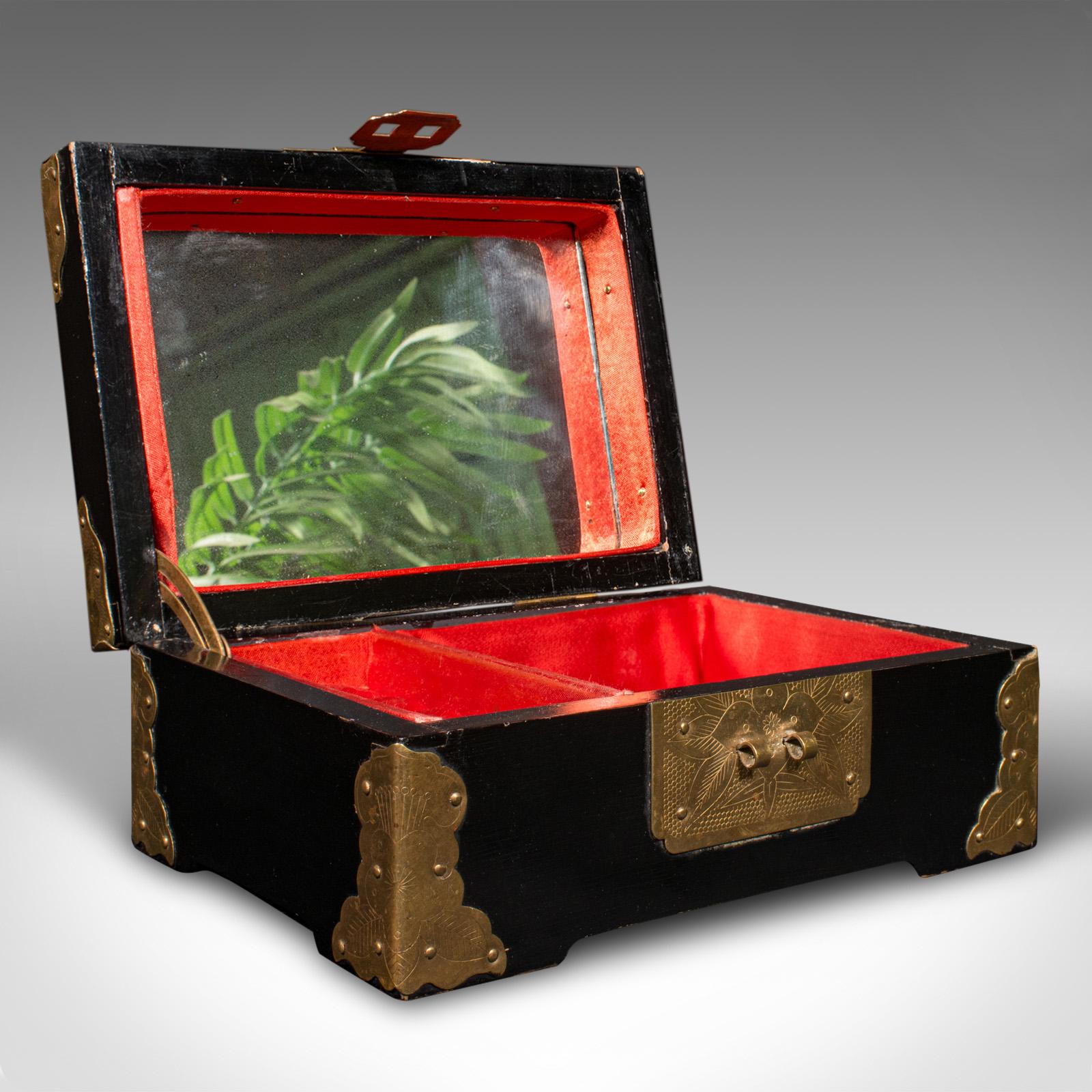 This is a small vintage decorative jewellery box. A Chinese, lacquer and soapstone keepsake case with mirror, dating to the Art Deco period, circa 1940.

Fascinatingly presented box with deep lacquered finish and brightwork
Displays a desirable aged