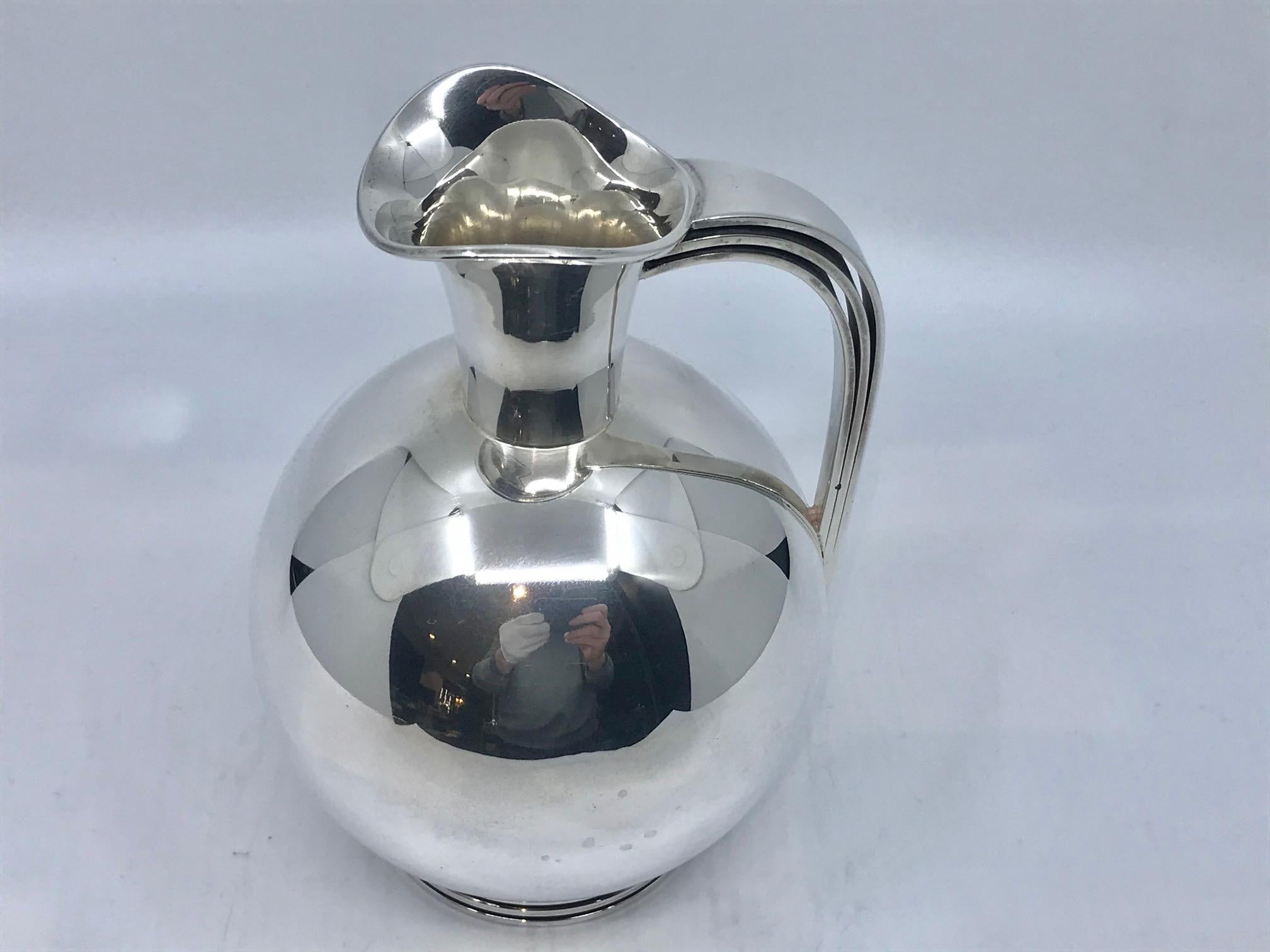 Small sterling silver Art Deco pitcher, design #896 by Svend Weihrauch from 1938. Beautiful Art Deco design, F. Hingelberg was one of the premier silver makers in Denmark at the time, their hand craftsmanship is of the absolute highest quality.
