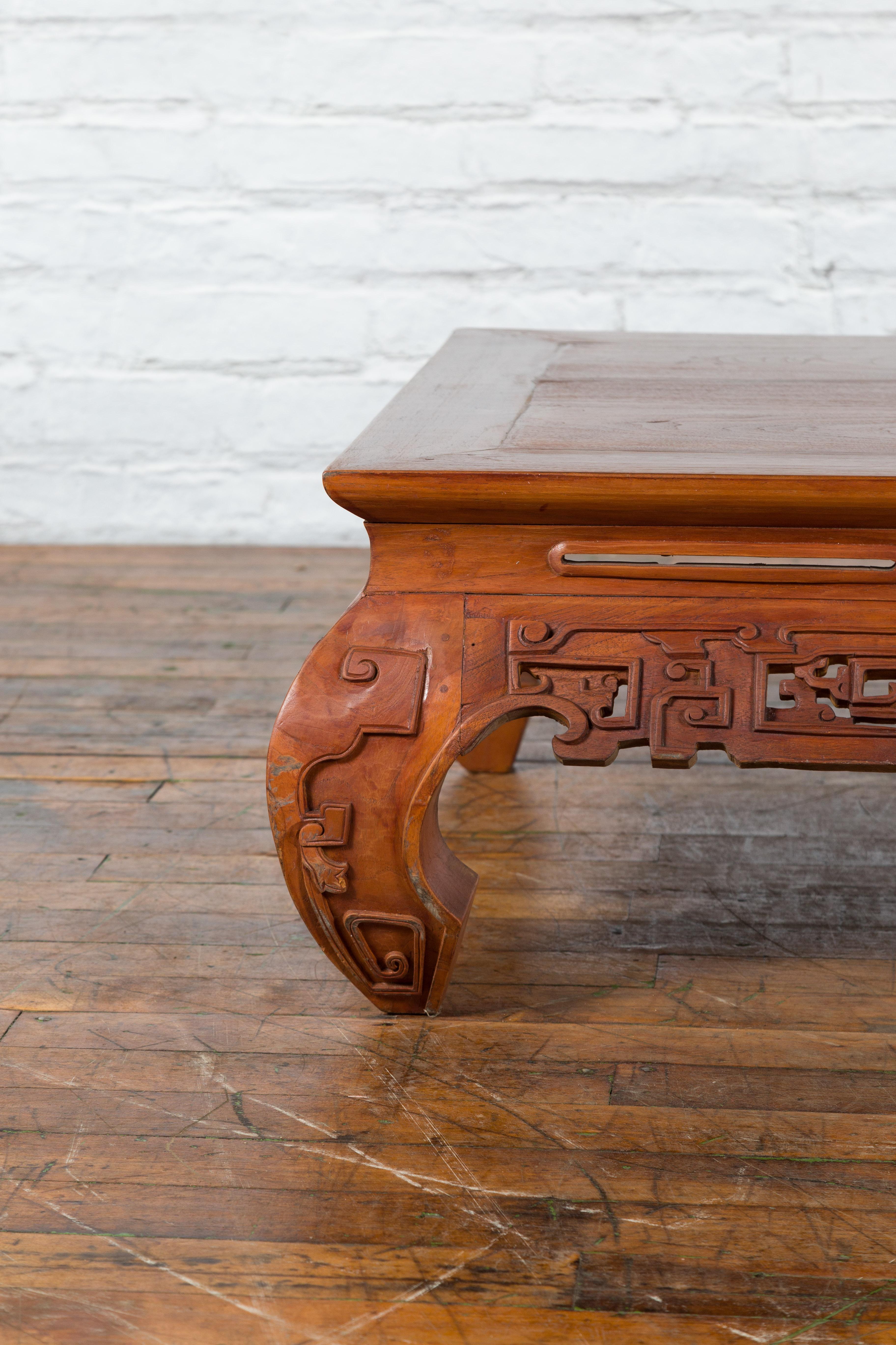20th Century Small Vintage Indonesian Coffee Table with Scroll-Carved Apron and Chow Legs For Sale