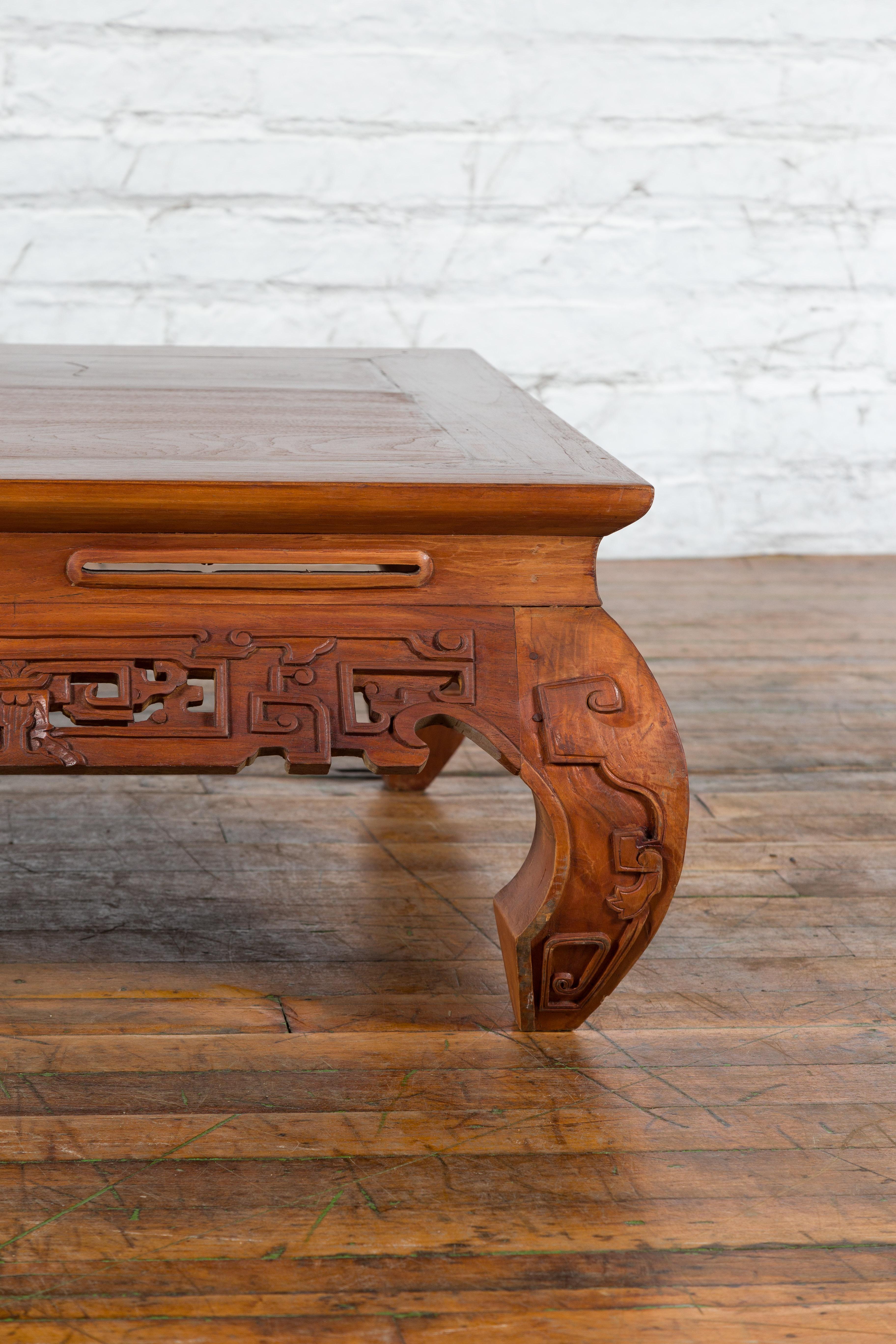 Wood Small Vintage Indonesian Coffee Table with Scroll-Carved Apron and Chow Legs For Sale