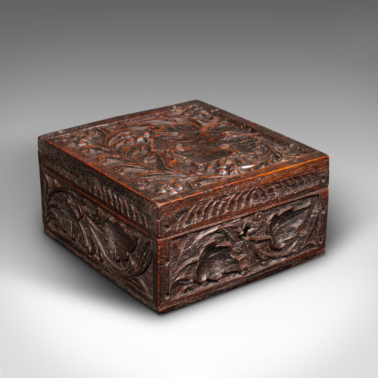 This is a small vintage keepsake box. An Indian, teak storage case with carved finish, dating to the late Art Deco period, circa 1940.

Petite and profusely carved box with appealing finish
Displays a desirable aged patina and in good original