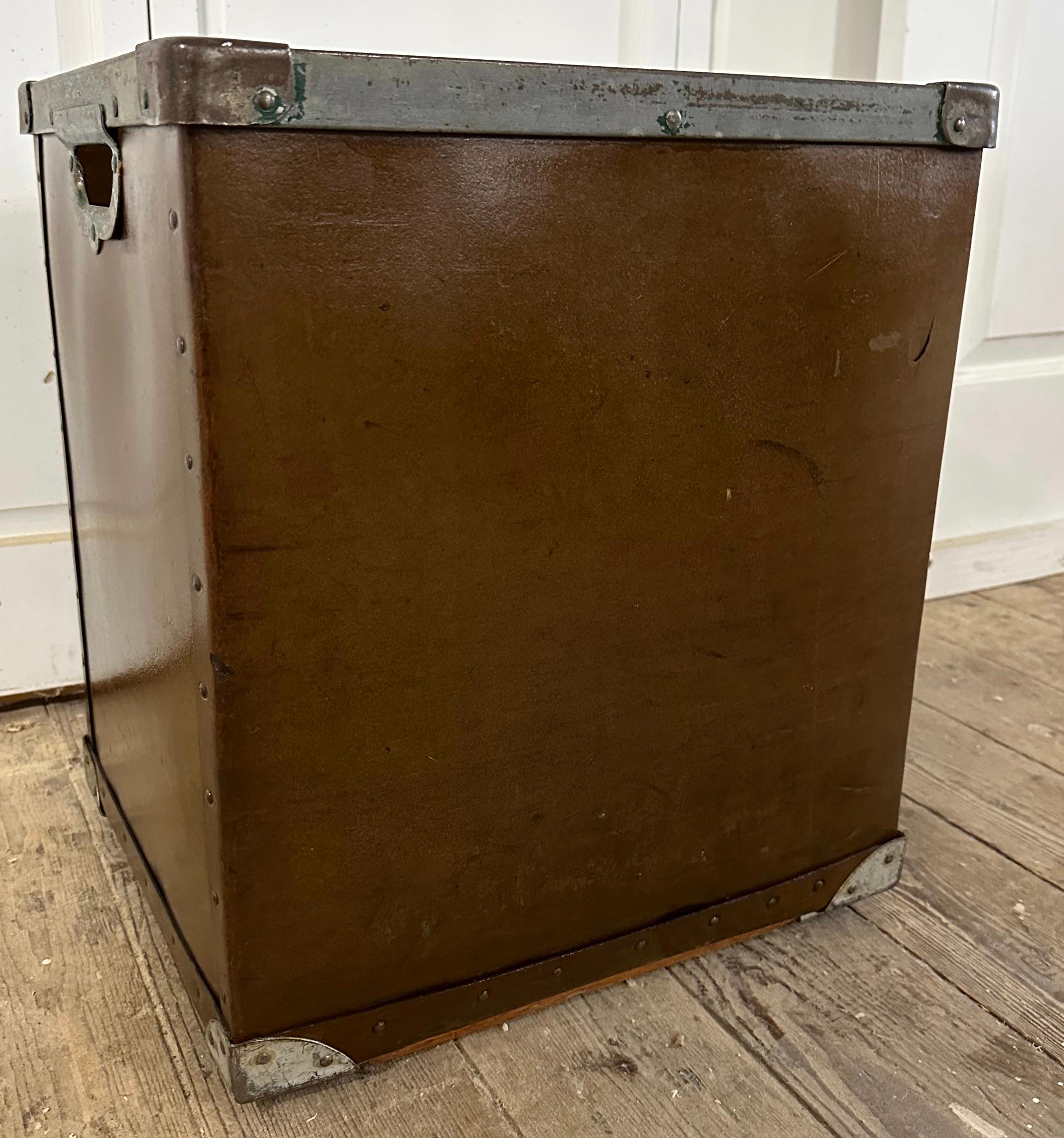 Made by Kennett, this Industrial style mail cart has two-hole handles with iron braces and metal studs. These mail bins or carts were used for sorting mail. Can be used for laundry cart or children toys storage and just any objects hanging around