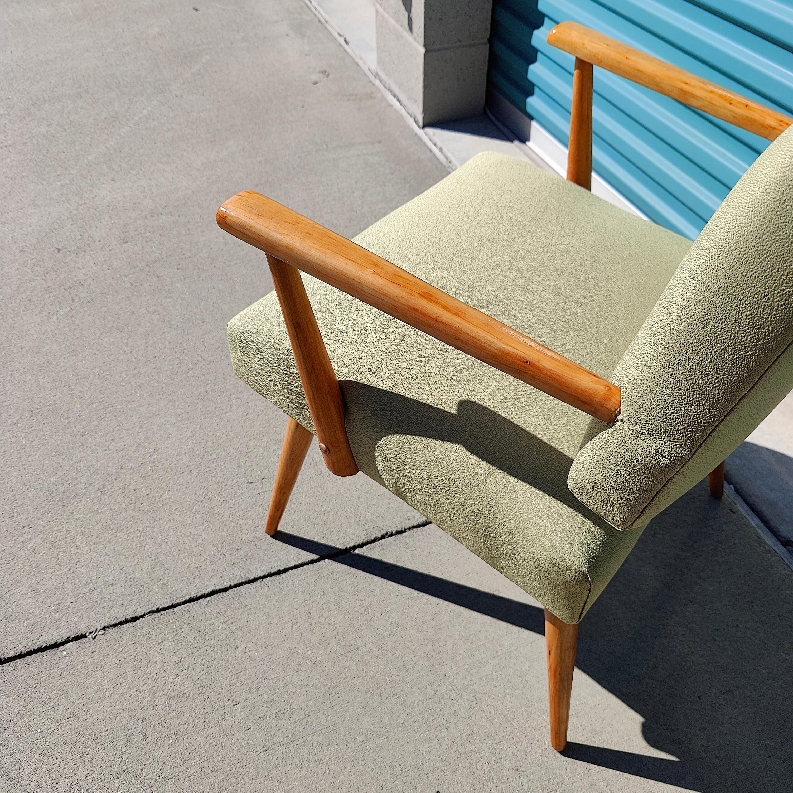 As dainty as they come, now available is a reupholstered lounge chair c1960s. Unknown manufacturer but resembles chairs in the manner of Jens Risom. Features an apple green finish with refinished wood

Measures approximately 24w x 20d x 31.5t with