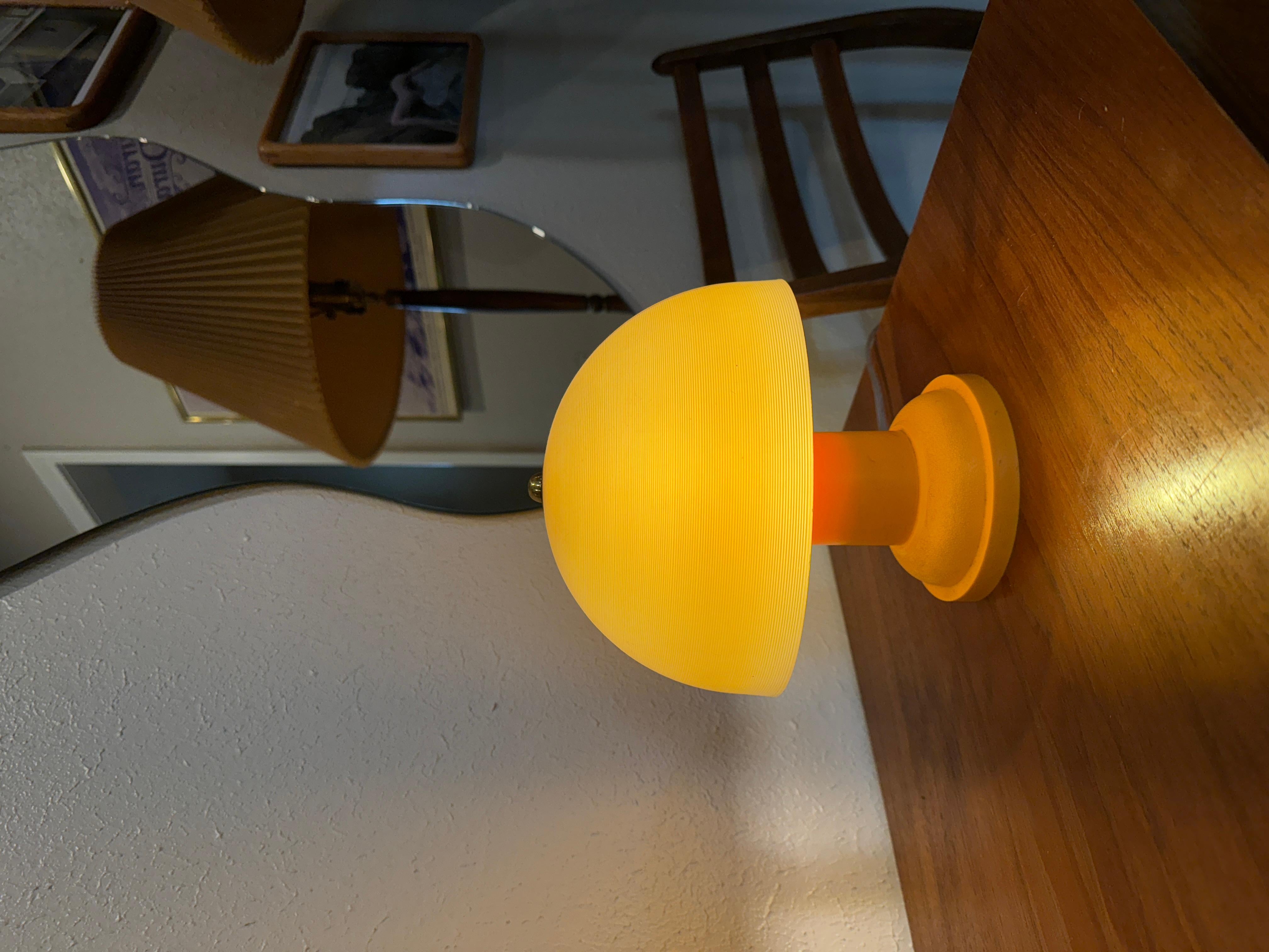 Small vintage orange mushroom lamp. 
Made of plastic.
Rewired and works perfectly. 
9” x 9”