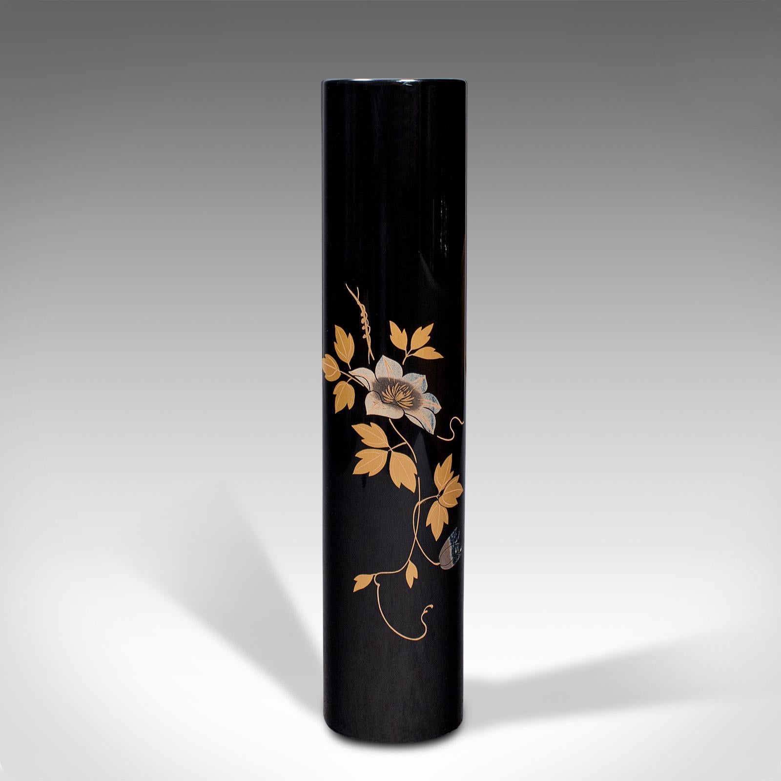 This is a small vintage stem vase. A Japanese, lacquered slimline posy pot, dating to the late Art Deco period, circa 1940.

Deep black tonality with delightfully contrasting foliate detail
Displays a desirable aged patina and in good