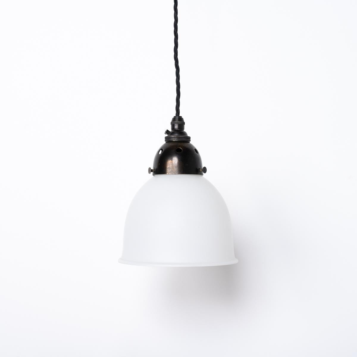 Small Opal GEC SUPASTONE Pendant Lights
SOLD AS A SET OF THREE

A beautiful set of small pendant lights

Matte opal white glass with aged brass fittings in an elegance shape that offer a stunning diffused glow when illuminated.

Manufactured in