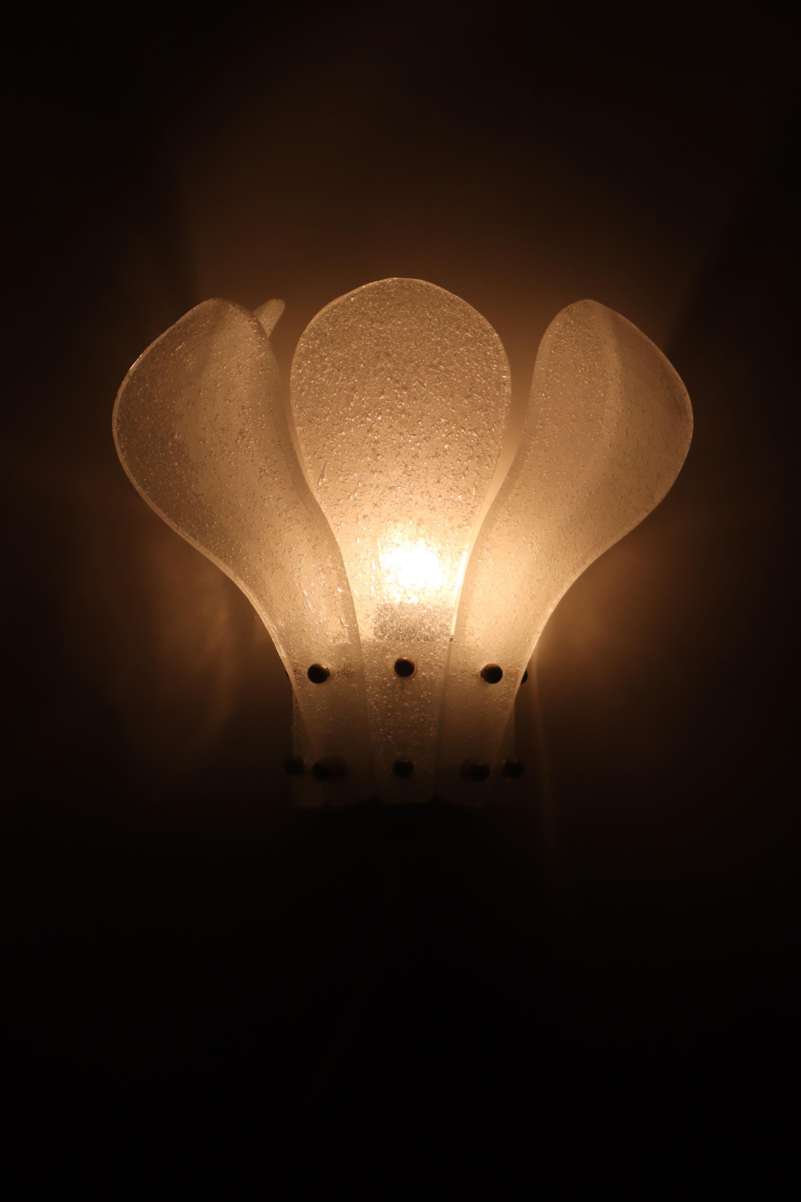 Beautiful small sconce in frosted glass, which can be attributed to Kalmar due to its workmanship. 
The five elements are arranged in the shape of a lotus blossom and add a touch of elegance to small rooms. Beautifully crafted and hard to find