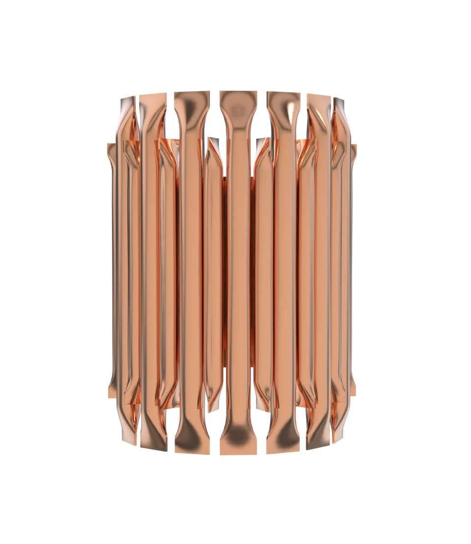 This unique lamp combines a Mid-Century Modern design with a Classic style that will make a statement in your home. Providing a subtle glow, this modern wall light is 100% handmade in brass and has a brushed nickel finish. With 4 lamps, we recommend