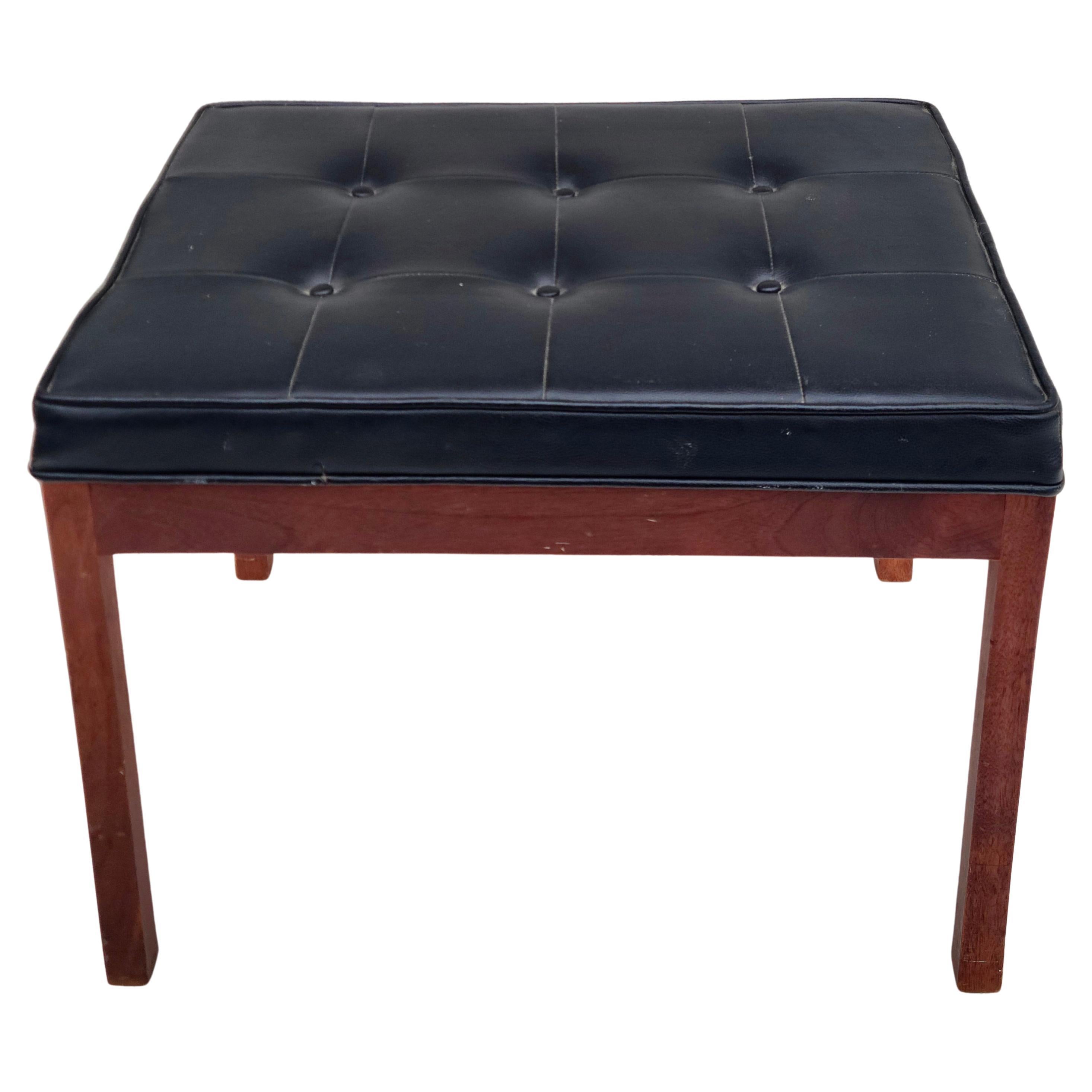 Please feel free to reach out for accurate shipping to your location.

Small mid century modern walnut and vinyl bench or ottoman.