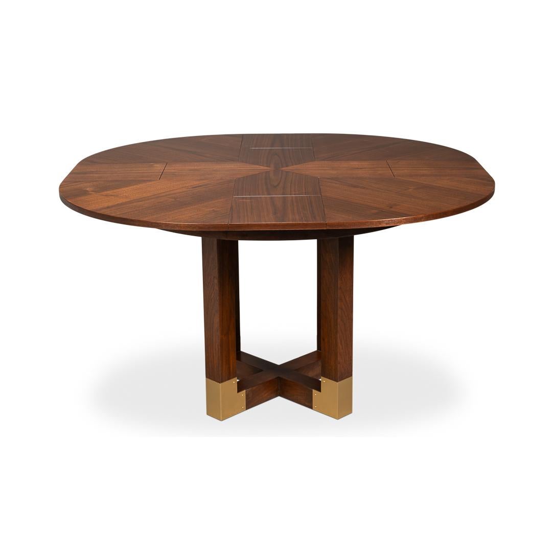 Blend the bold geometry of Art Deco with the timeless elegance of Mid-Century Modern design. Its round top showcases a striking radial veneer pattern in rich dark walnut, creating a captivating sense of depth and movement. Designed to adapt to your