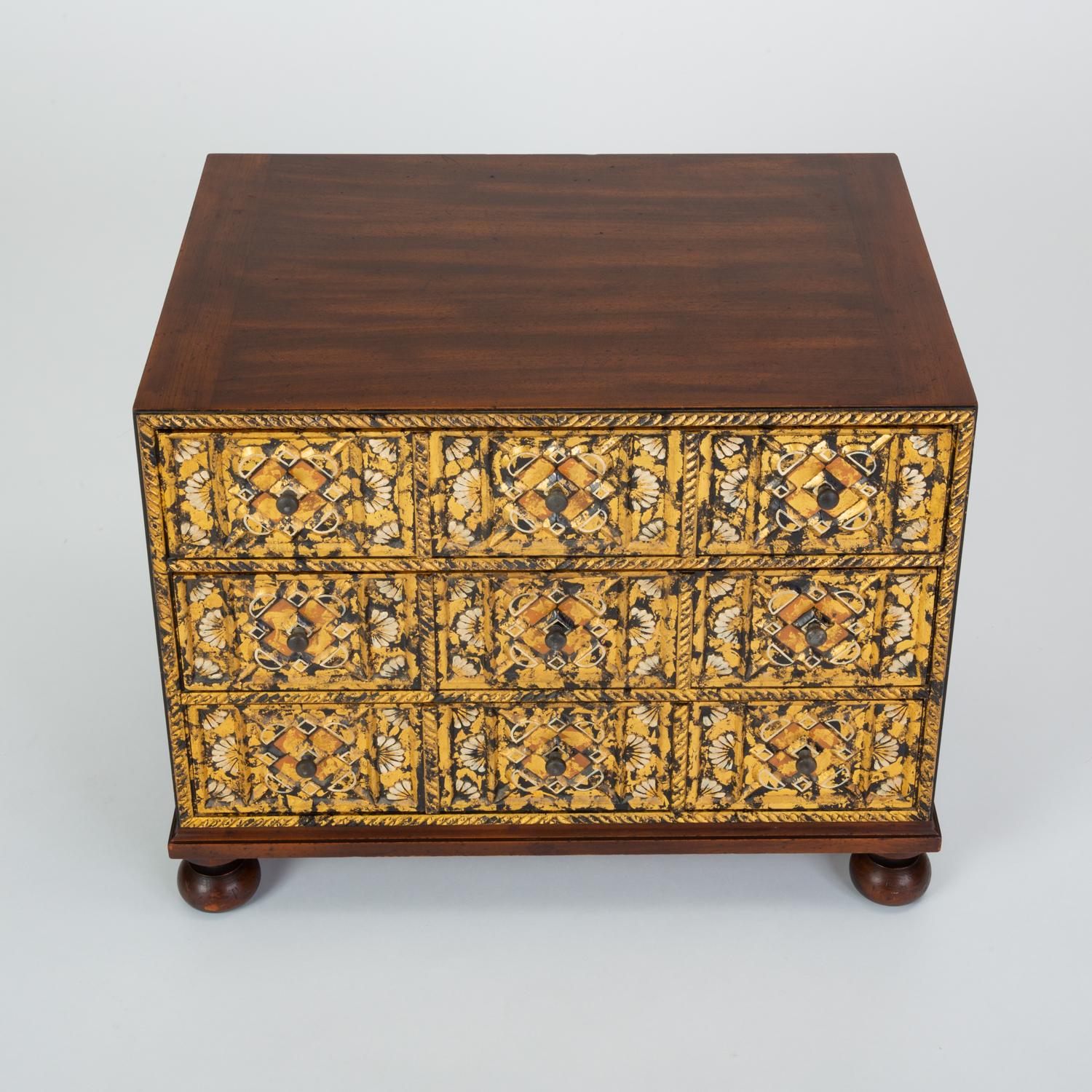 A small chest of drawers or side cabinet in Spanish Renaissance Revival style by Grand Rapids manufacturer John Widdicomb. Made originally by a Widdicomb subsidiary, William A. Berkey, this example is likely from the mid-1970s when the Berkey name