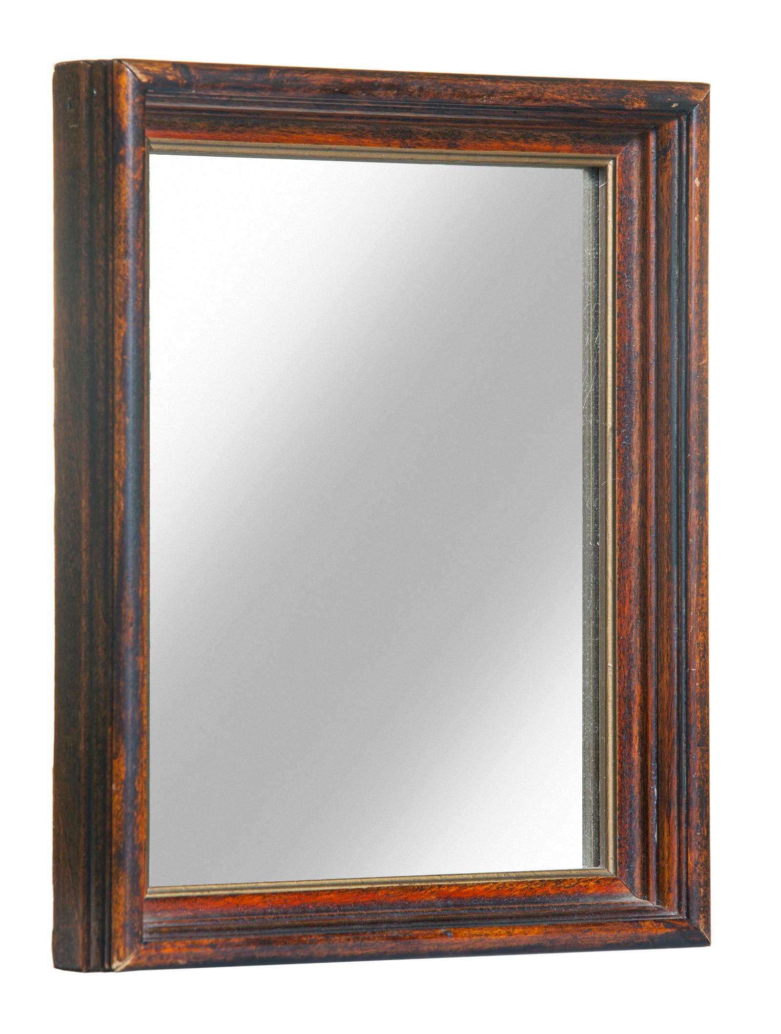 This lovely accent mirror adds a touch of elegance to any decor.
Handcrafted in walnut with original finish. 
New mirror & backing. 
Wired to hang both ways.