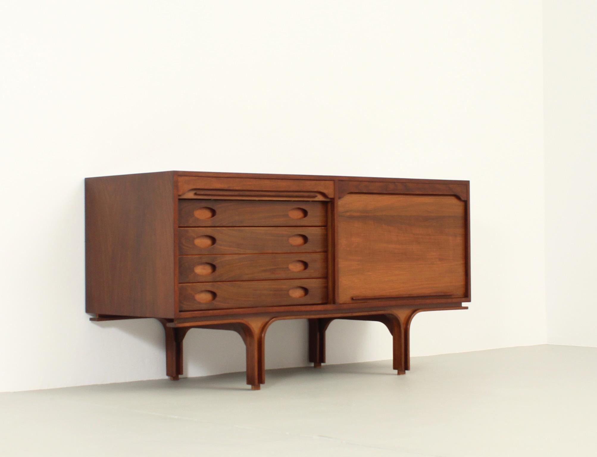 Sideboard with tambour doors designed in 1957 by Gianfranco Frattini for Bernini, Italy. Walnut wood. Four drawers and one spaces with shelves. This sideboard can be matched with another larger one.