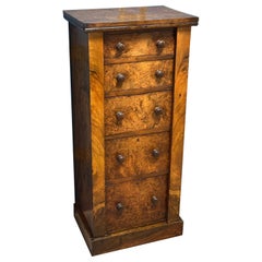 Small walnut wellington chest of drawers