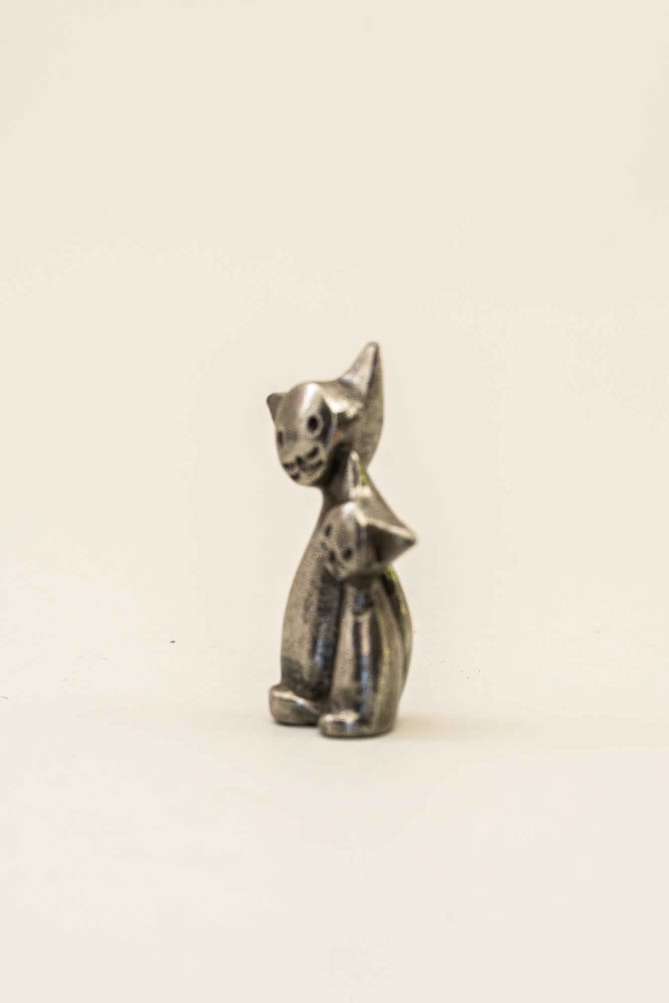 brass cat figurines
