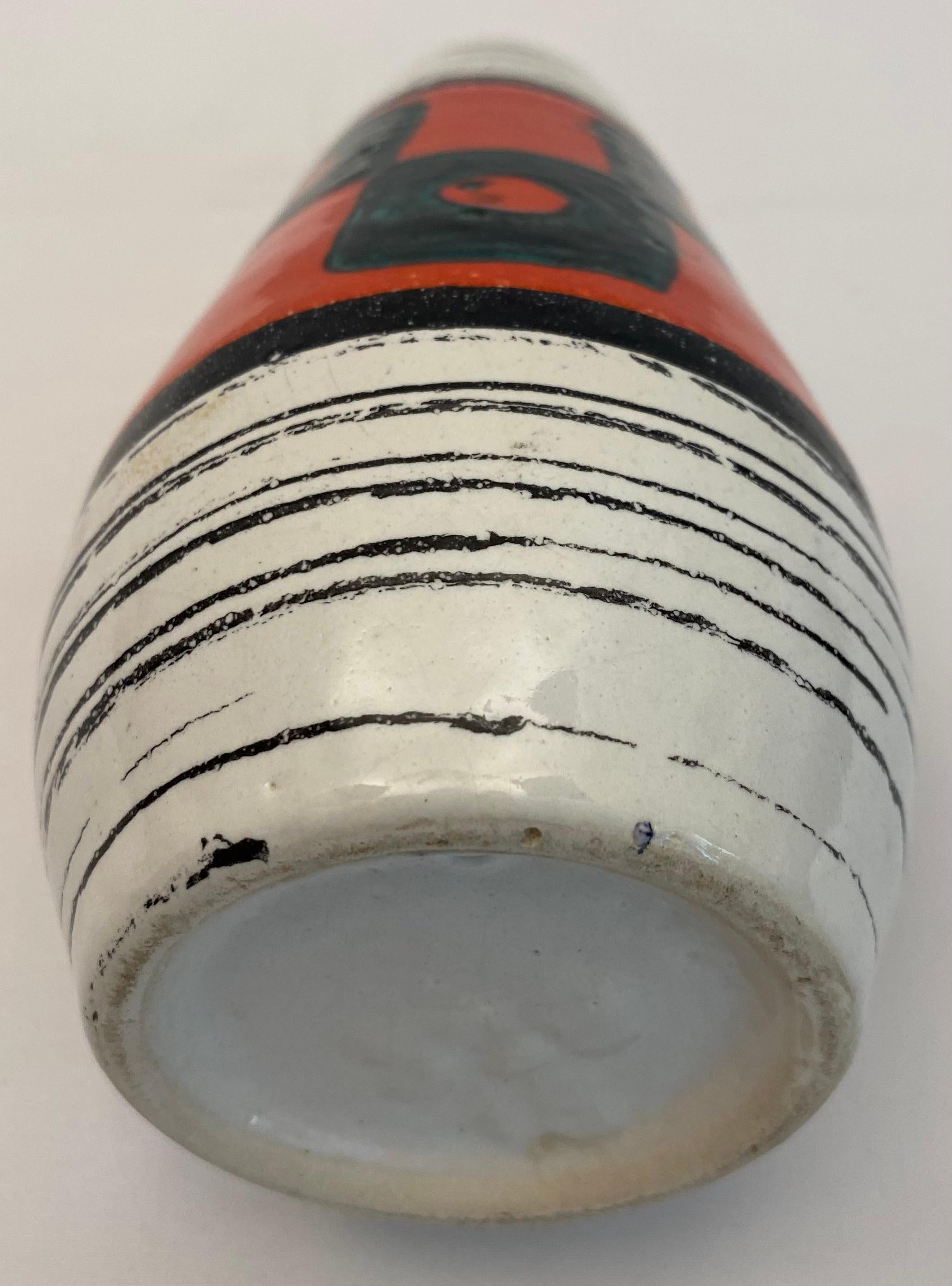 A fine quality mid-century ceramic vase from West Germany, circa 1970s. 
Hand-crafted using centuries old techniques. 

This West Germany ceramic vase epitomizes the sharp, clean lines and bold design associated with Mid-Century Modernism. The vase