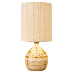 Piccola lampada da tavolo in ceramica bianca e oro di Georges Pelletier