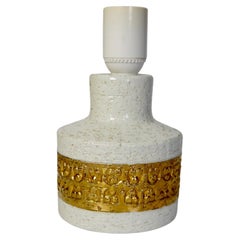 Piccola lampada da tavolo in ceramica bianca e dorata, di Aldo Londi per Bitossi, Italia anni '60
