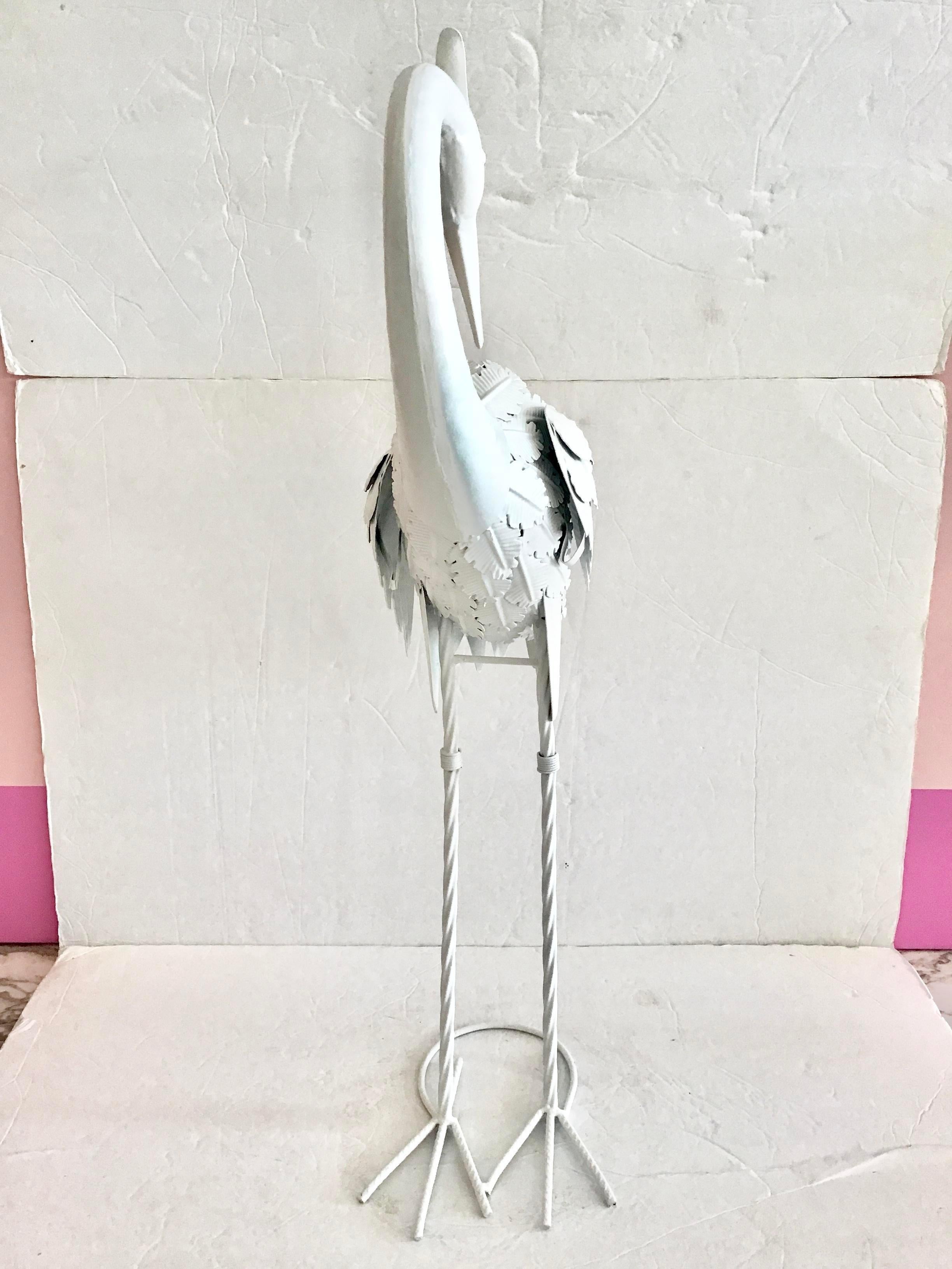 Beautiful boho chic small metal stork grooming itself freshly lacquered in white. Great addition to your Palm Beach and Boho Chis inspired decor. See our collection of stork statues in our listing.