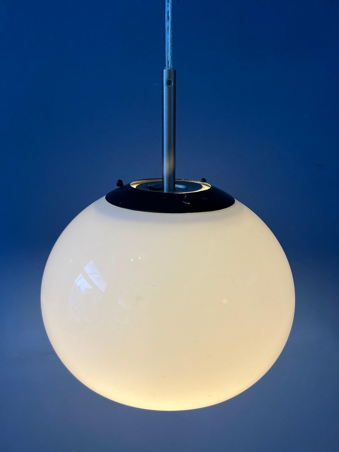 Small white space age mushroom pendant lamp. The mushroom shade is made out of acrylic glass and produces a warm, cosy light. The lamp requires one E27/26 (standard) lightbulb.
2 pieces available

Additional information:
Materials: Metal,