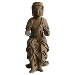 Small wooden Buddha statue from the Edo period in Japan/17th to 19th century