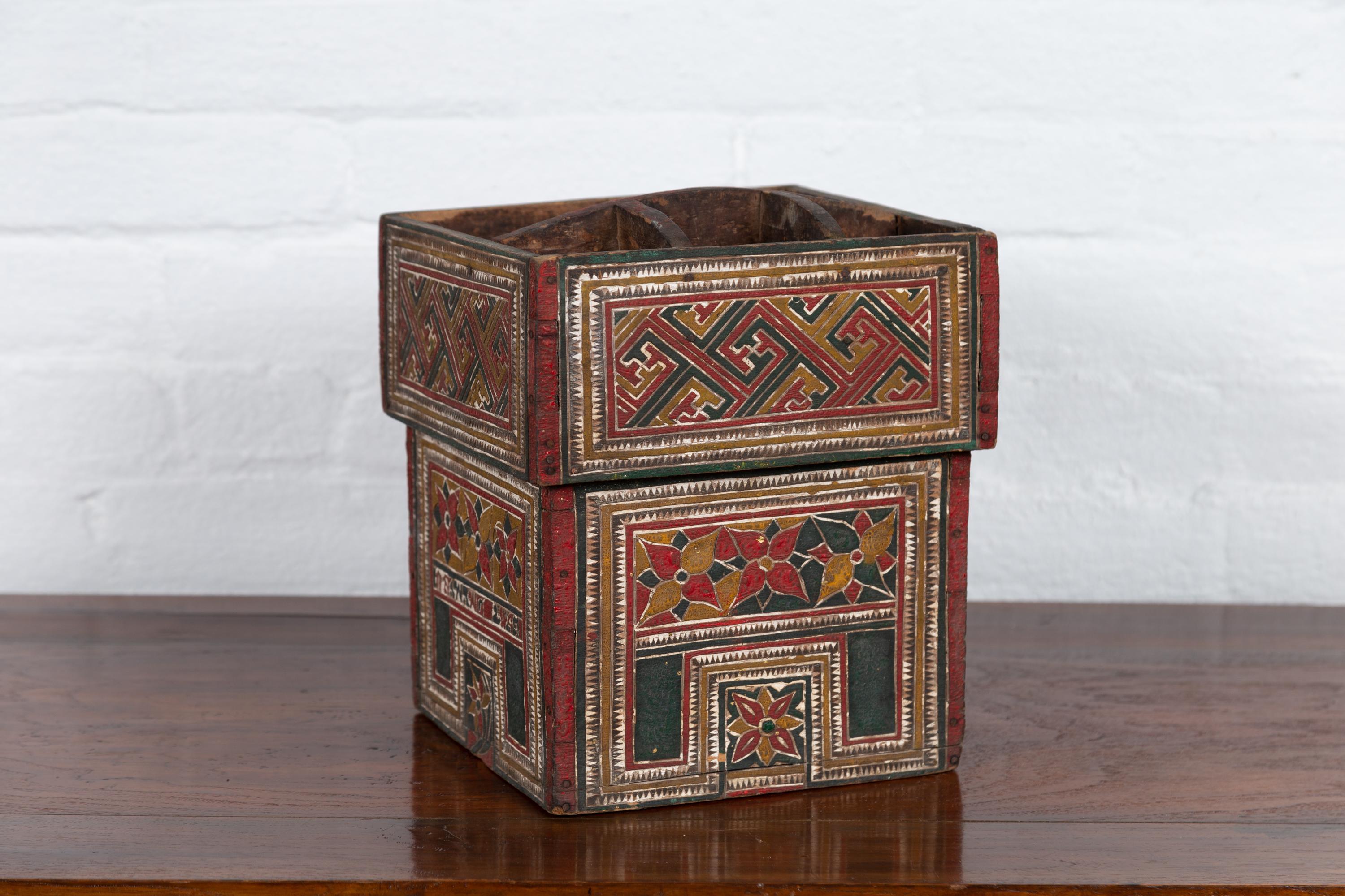 An antique Thai wooden betel nut box from the early 20th century, with polychrome decor. We have more boxes available, see image 3 to view two other boxes that would work well as a part of a set (items LU863915598752 and LU863915598782). Born in