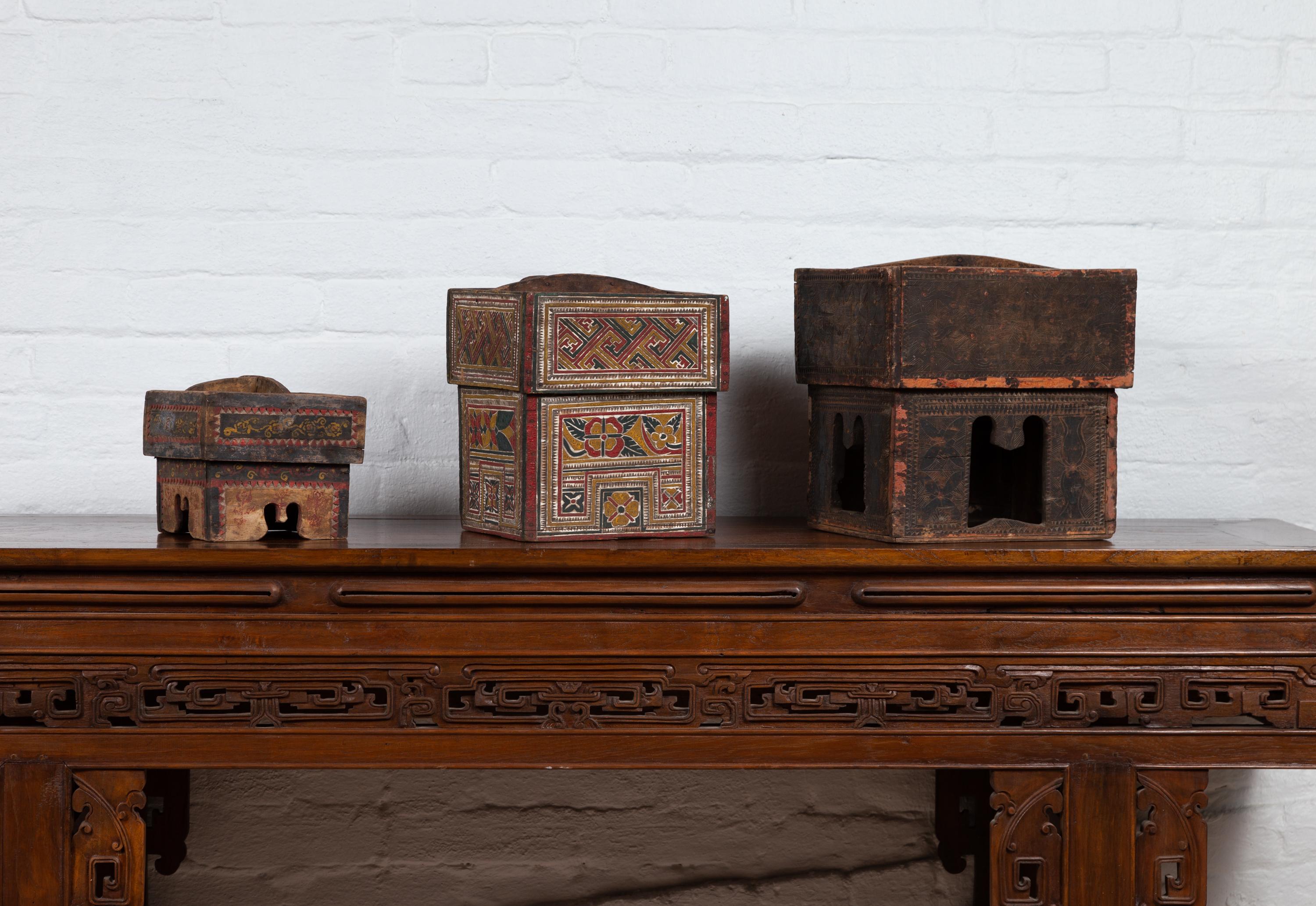 Polychromed Small Wooden Thai Betel Nut Box with Polychrome Geometrical and Floral Patterns