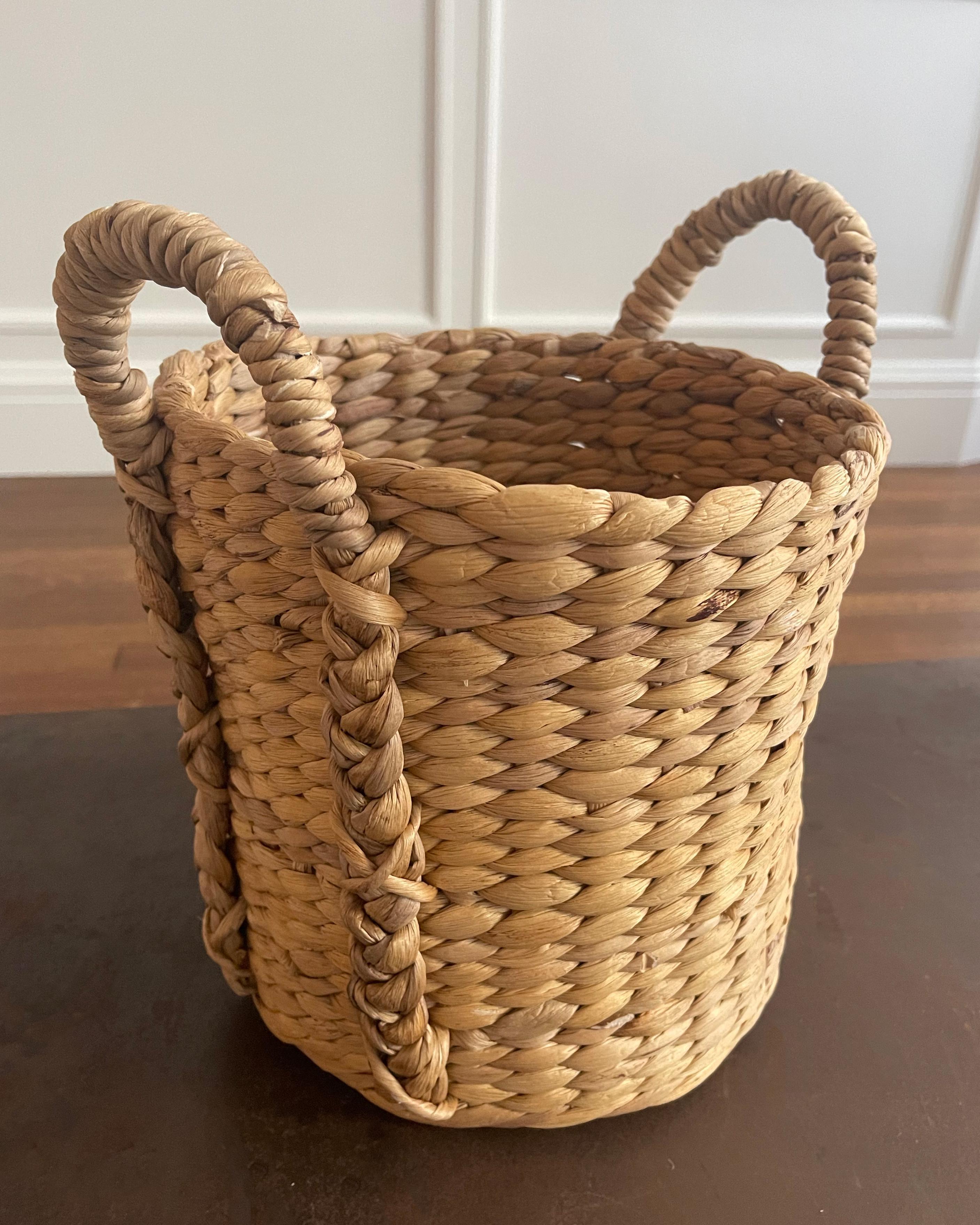 Extra small beachcomber-style basket handwoven from natural fibers.
