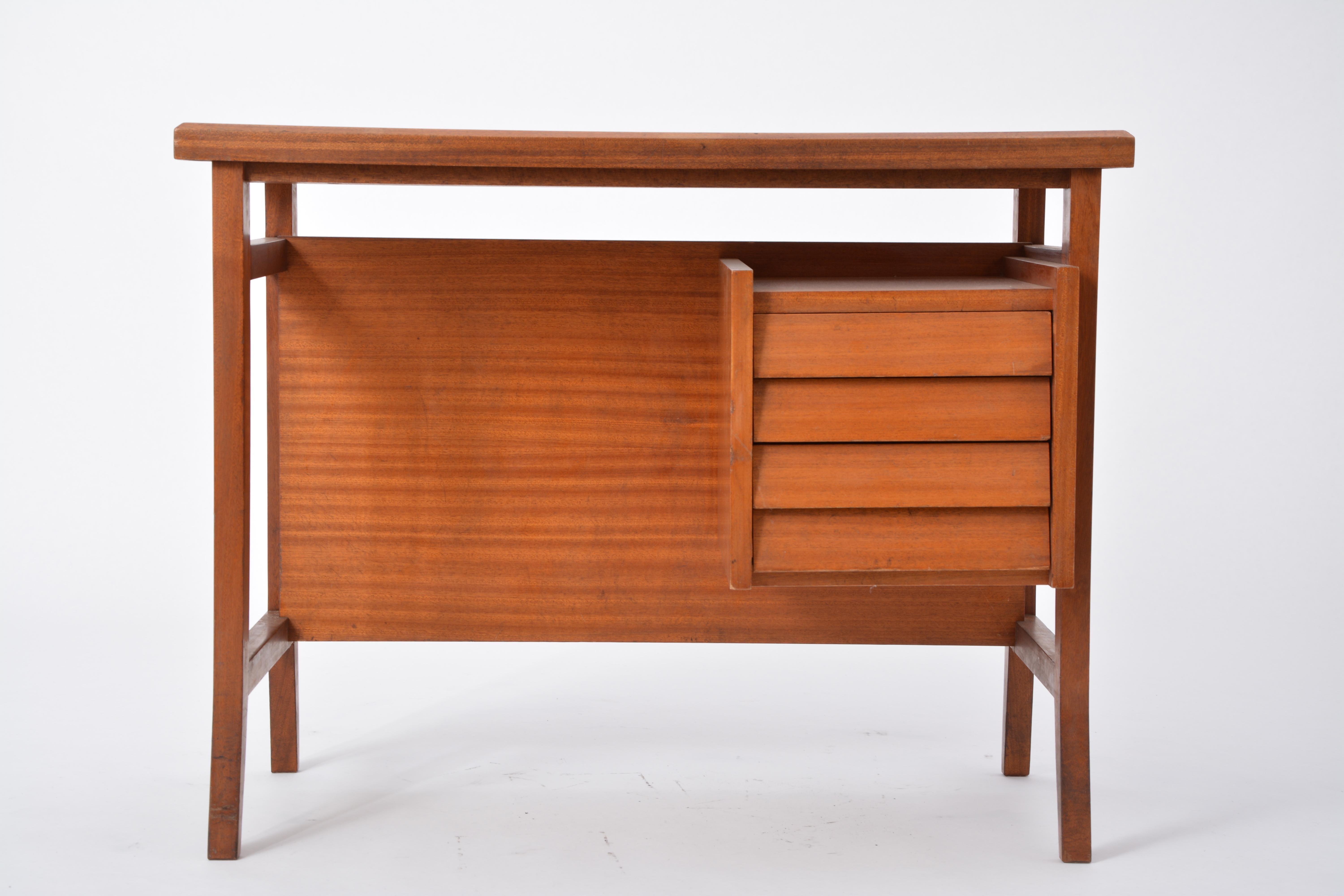 Small writing desk designed by Gio Ponti for Schirolli. Produced in the 1960s in Italy. The table has four drawers on the right part, is made of wood and has a formica top in light green.