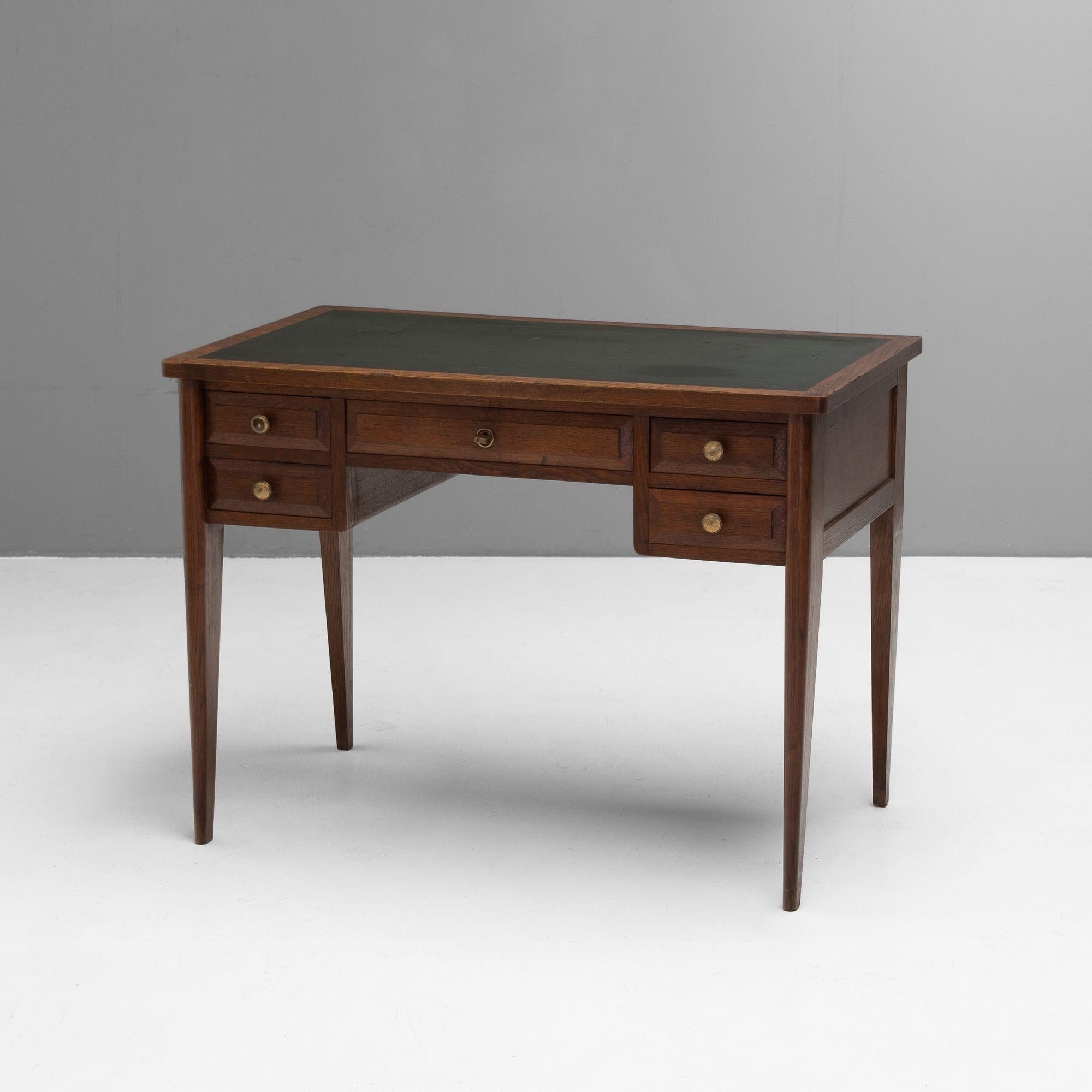 Small early 20th Century oak desk with original patinated leather top and brass handles.
France circa 1930.
H 74cm (AH 60cm) x W 100cm x D 60cm
Ple\se be in touch for an accurate shipping quote.