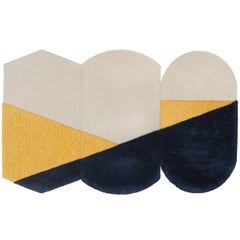 Piccolo trittico di tappeti Oci giallo-grigio di Seraina Lareida