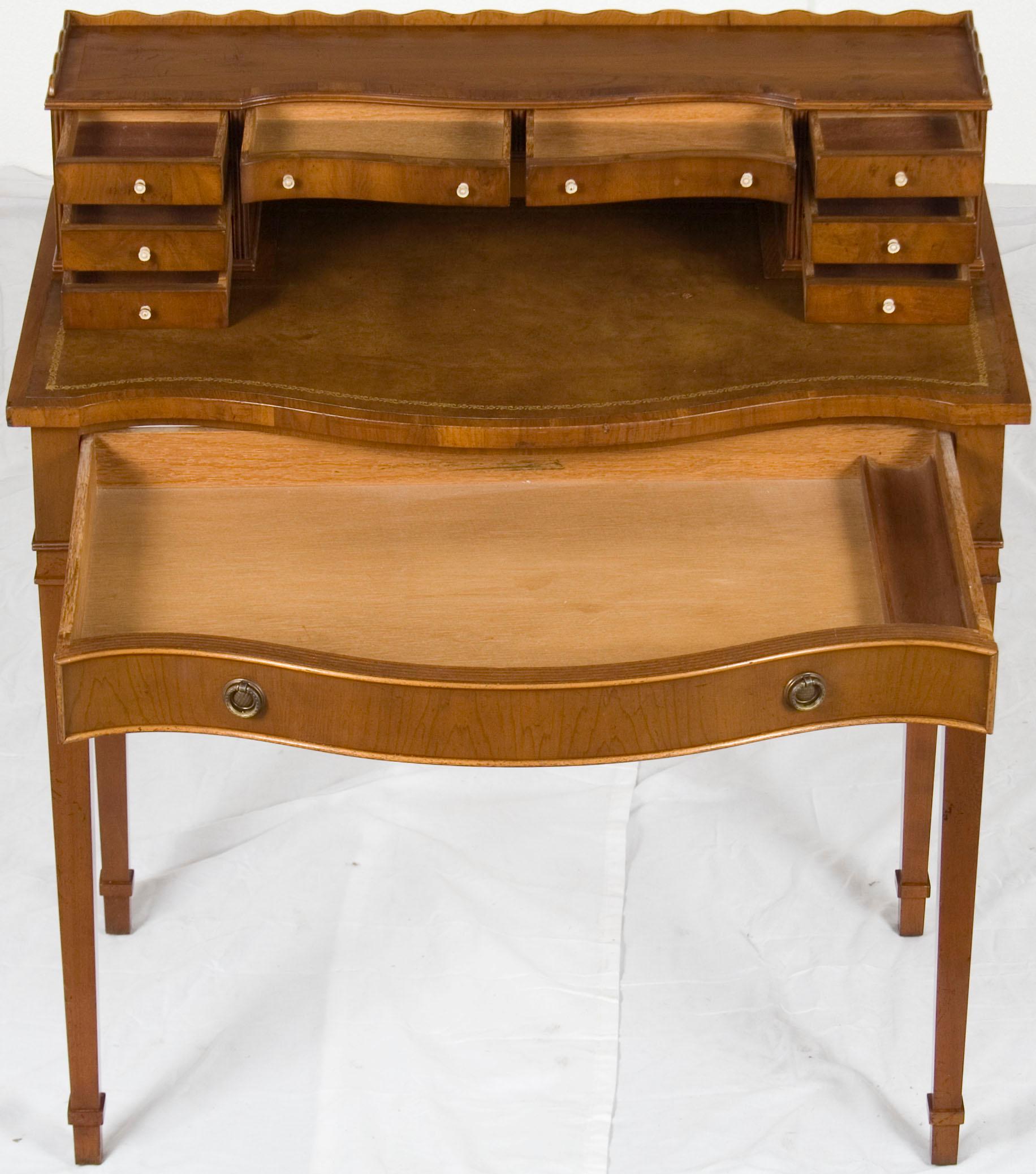 Fresh over from England, this small side desk provides function in tiny spaces. Probably made sometime around the year 1960, this piece works equally well in both the office, bedroom, or living room. Whether used to compliment an existing desk or