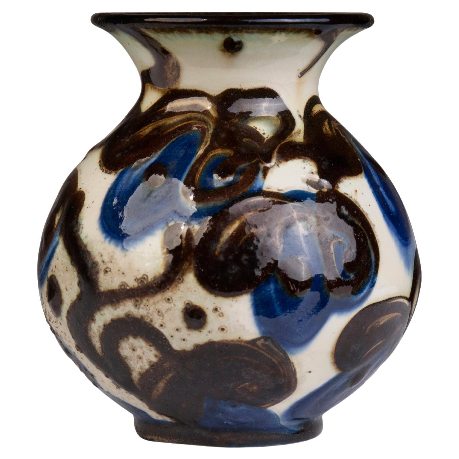 Smaller Danish horn-decorated earthenware vase with blue flowers on a light base For Sale