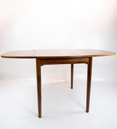 Smaller Dining Table in Rosewood with Extentions of Danish Design from the 1960s