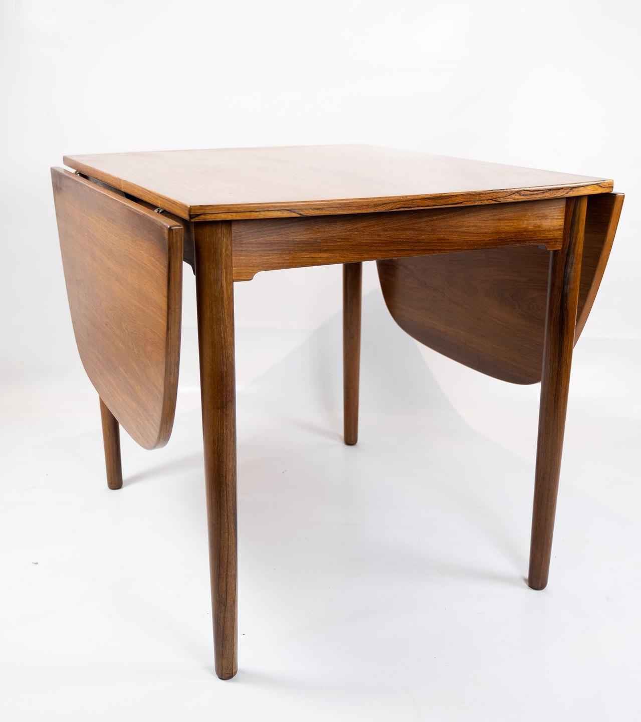 Scandinavian Modern Smaller Dining Table in Rosewood with Extentions of Danish Design from the 1960s For Sale