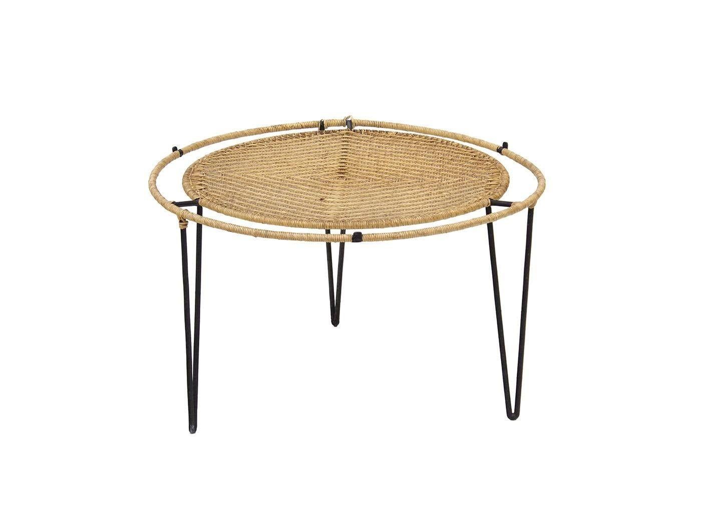 USA, 1950s
Round, smaller scale iron and raffia coffee table. Unknown designer- in the style of pieces by Van Keppel and Green or Luther Conover. This has a few tabs to the iron frame that could hold a glass top in place if desired. Smaller in