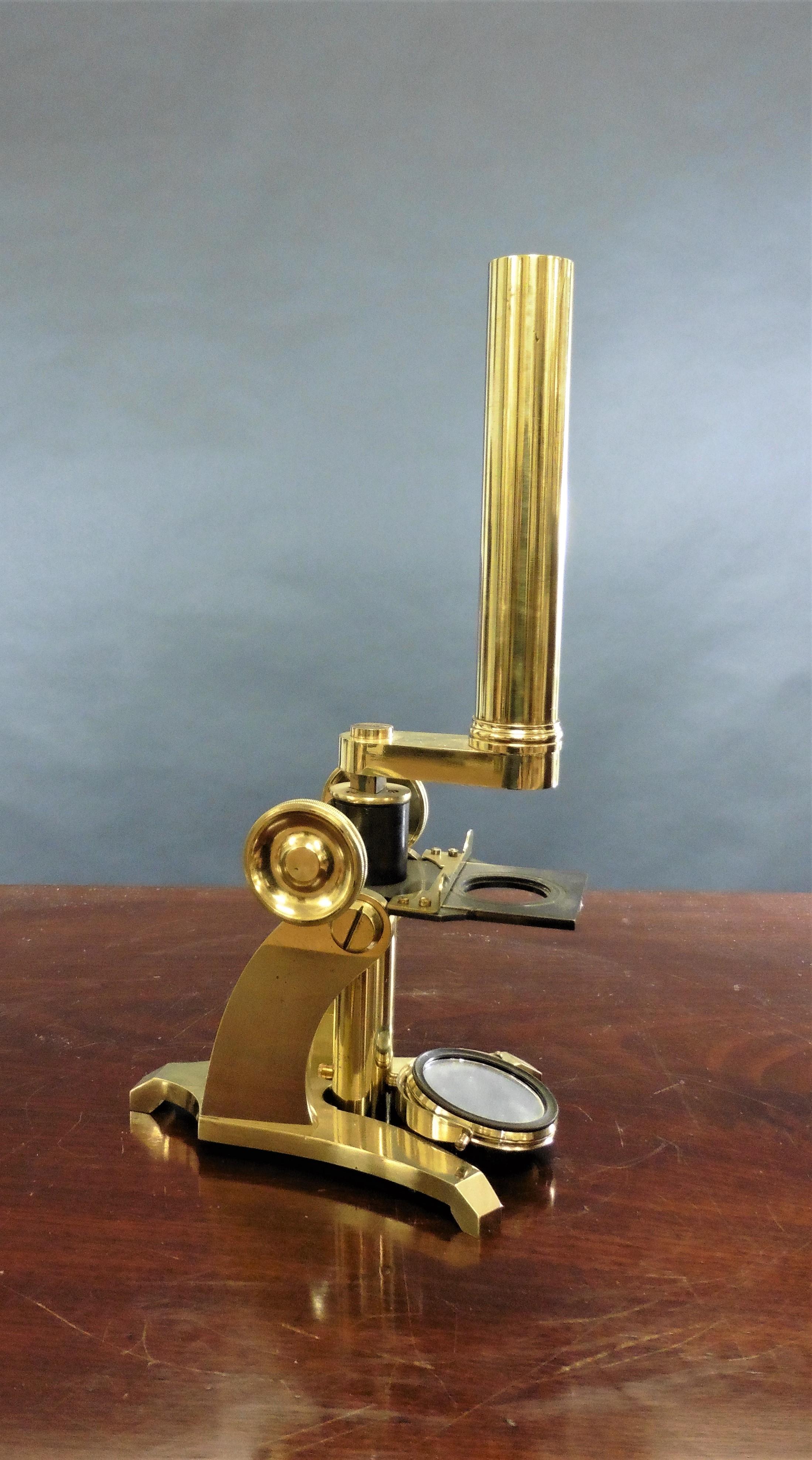 Small Victorian monocular field microscope


Brass framed monocular field microscope house in it’s original mahogany box with hinged brass carrying handle.

The interior of the box with bottom slider and top mounted sliding drawer and holder