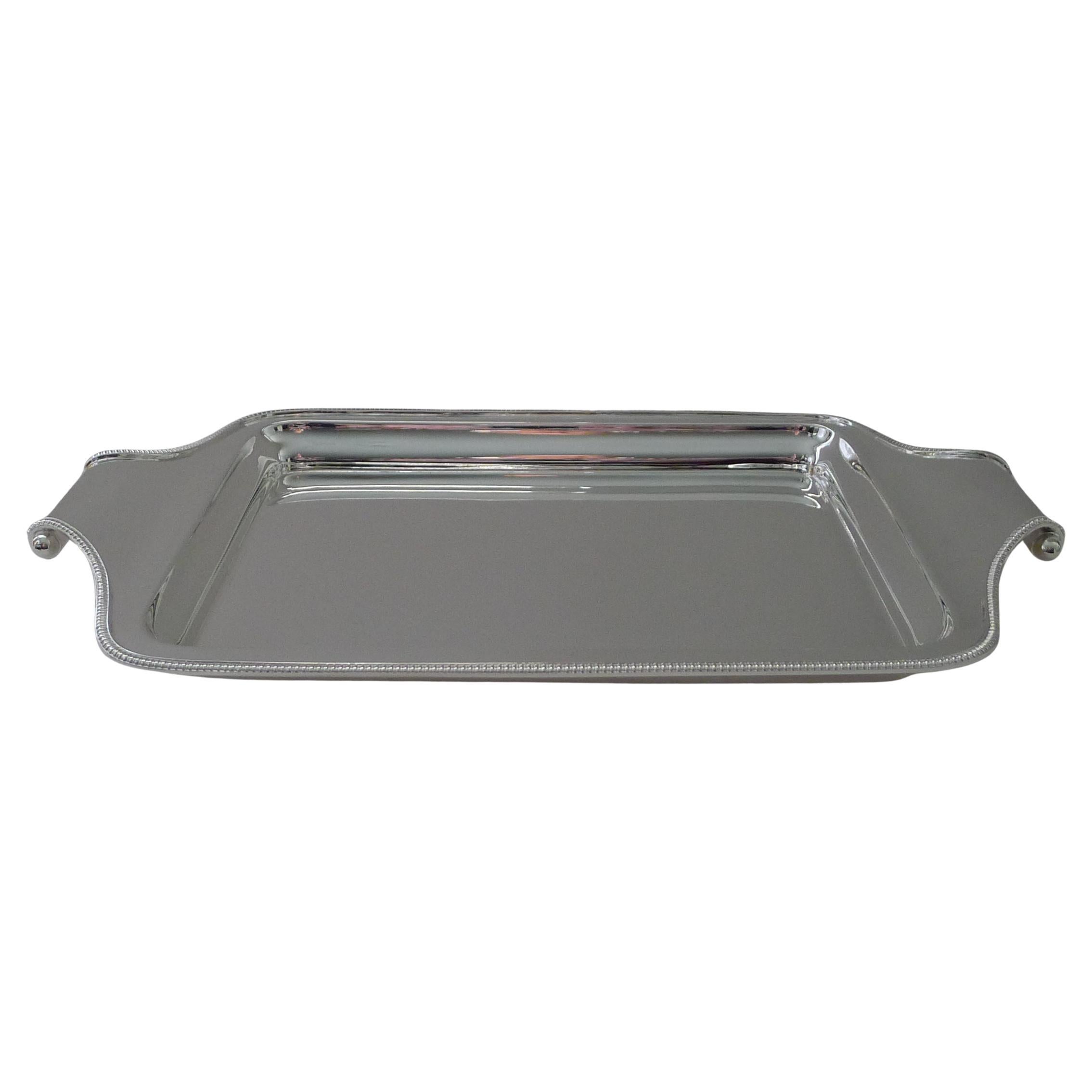 Elegante bandeja de cóctel/bebidas antigua chapada en plata c.1910