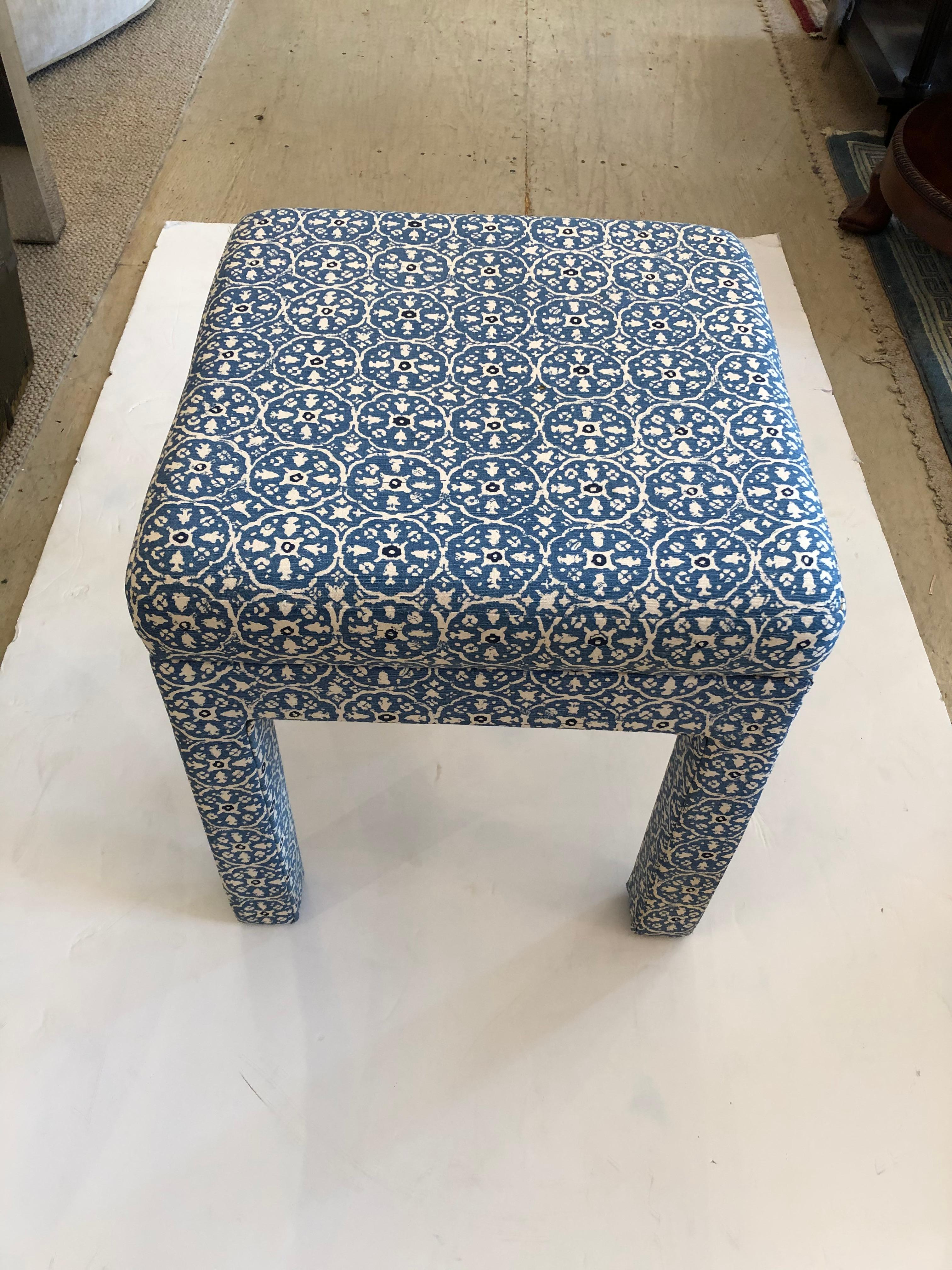 A great looking square parsons style ottoman upholstered in what looks like stunning blue and white quadrille linen.  Fabric is China Seas Nitik II in Blue/FloresBlue