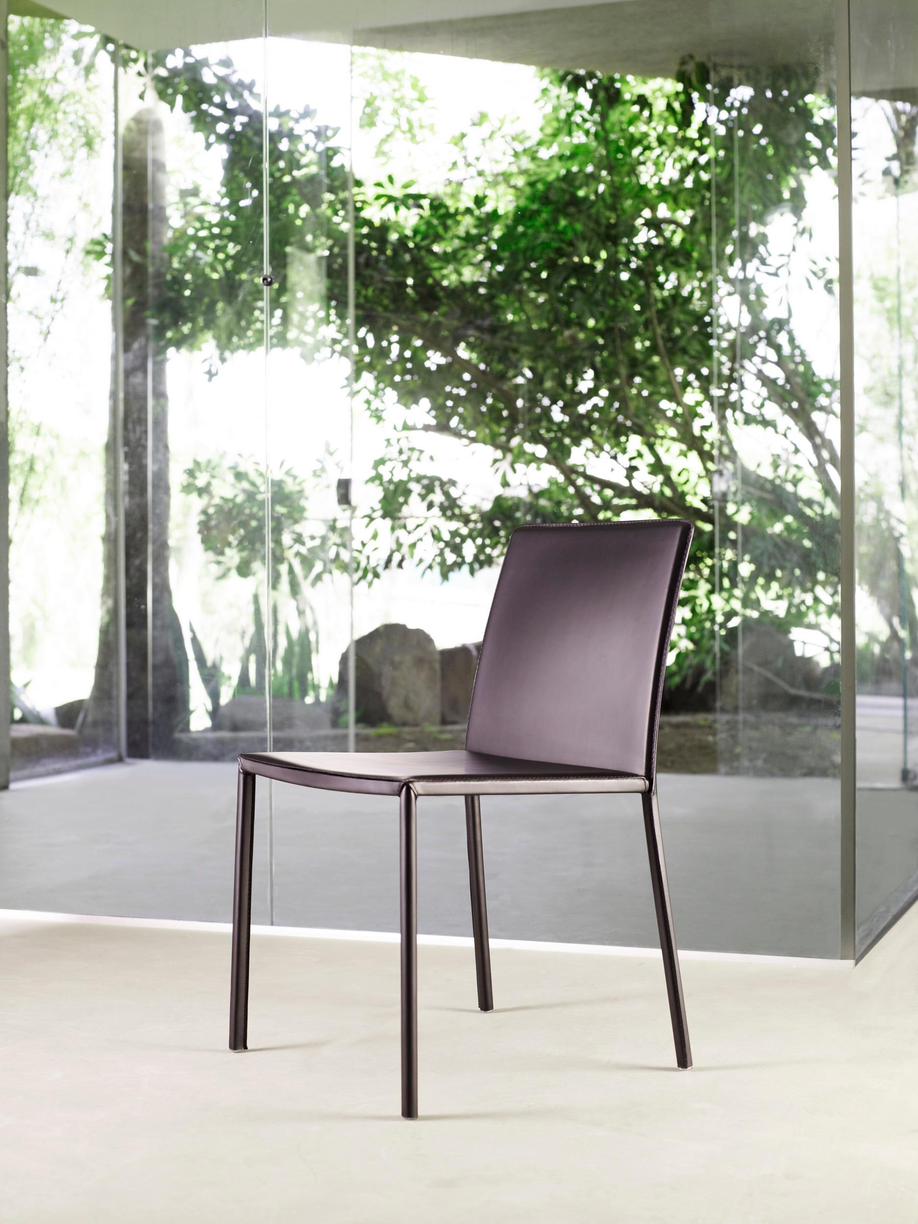 Smart Chair by Doimo Brasil
Dimensions: W 52 x D 57 x H 81 cm 
Materials: Metal, covered with reconstituted leaher.

With the intention of providing good taste and personality, Doimo deciphers trends and follows the evolution of man and his space.