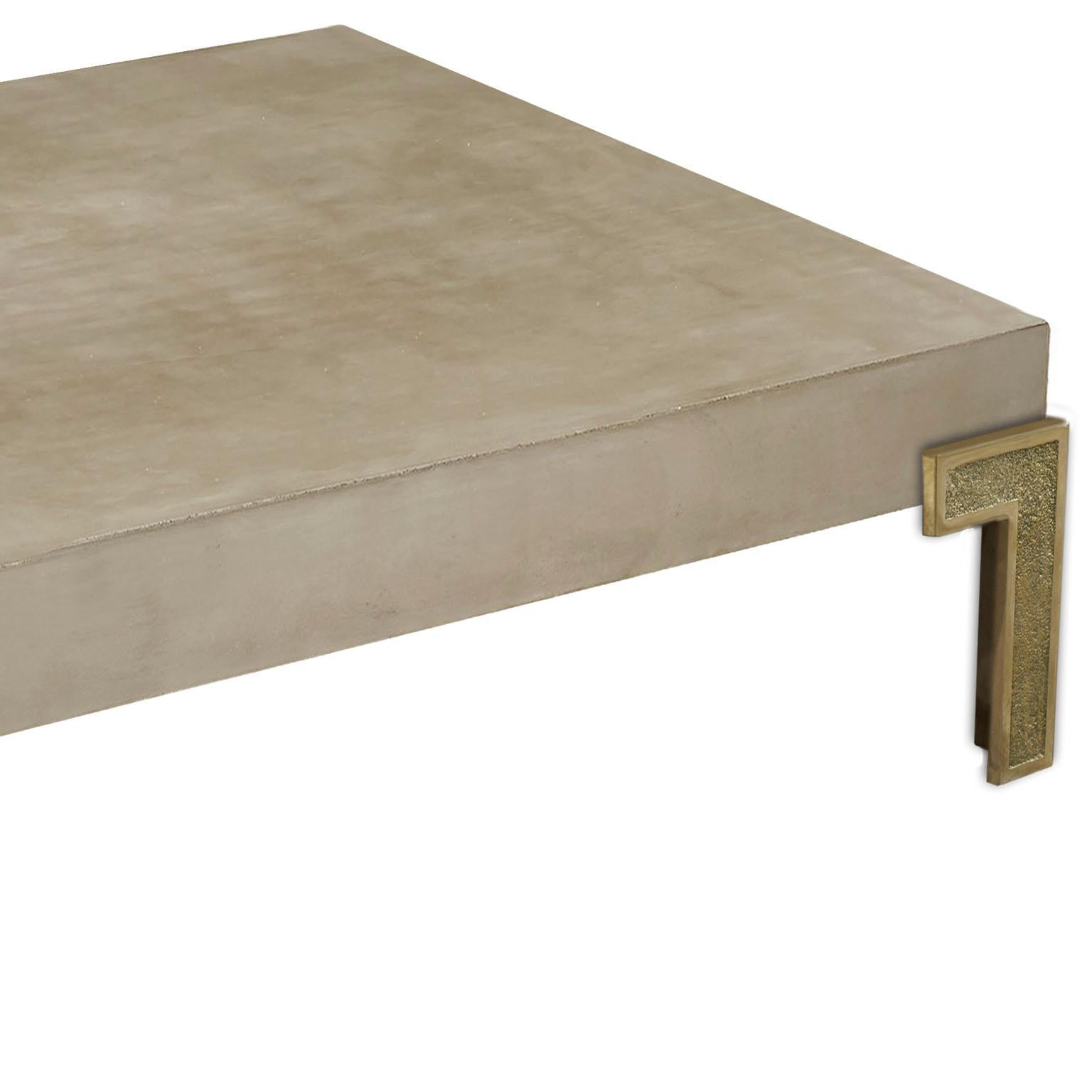 concrete and brass coffee table