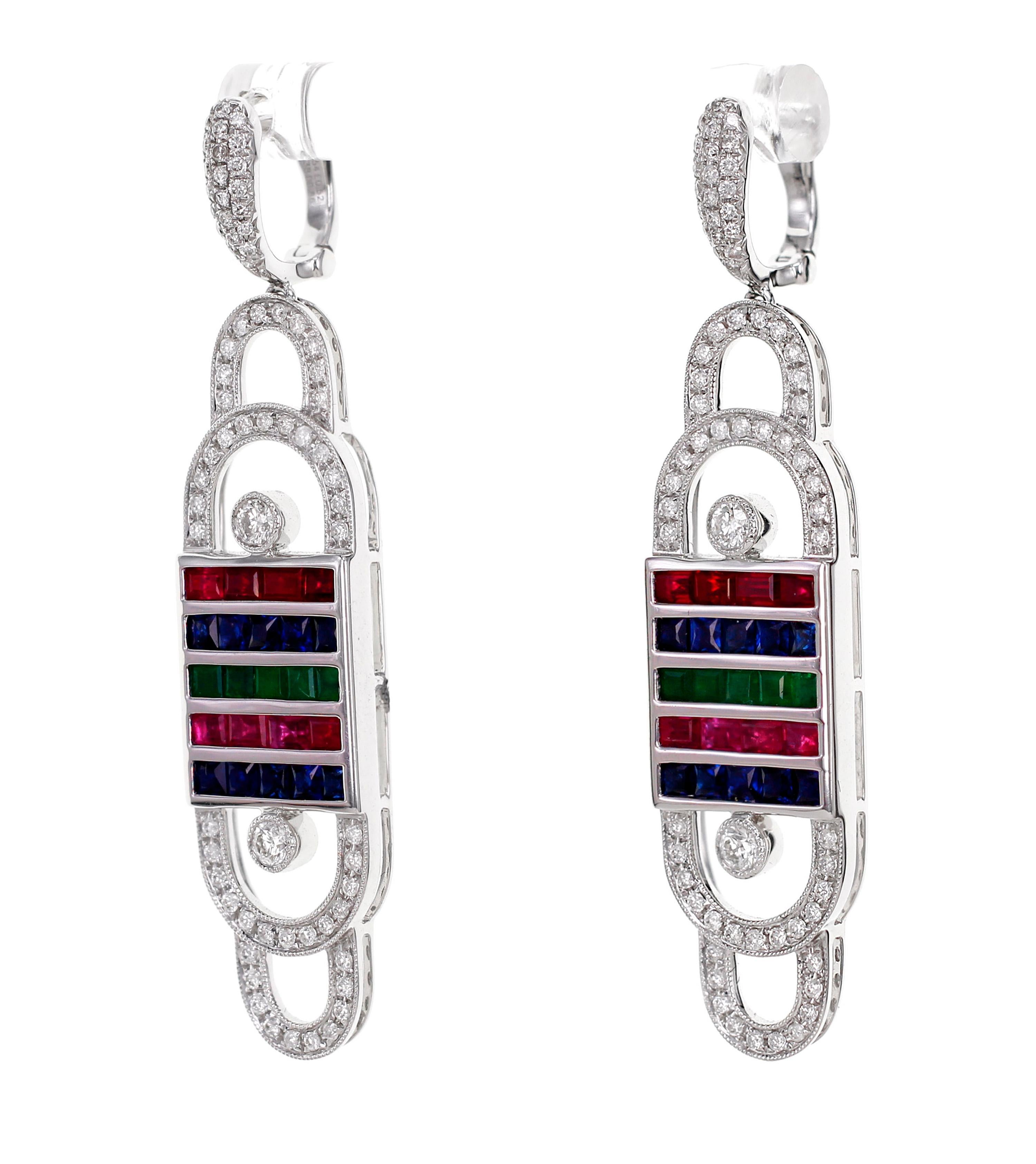 Ruby , Sapphire and Emerald are used in this wacky design. In a twist to art deco, this earring gives a nostalgic feel to old televison set display and smartphone display. 