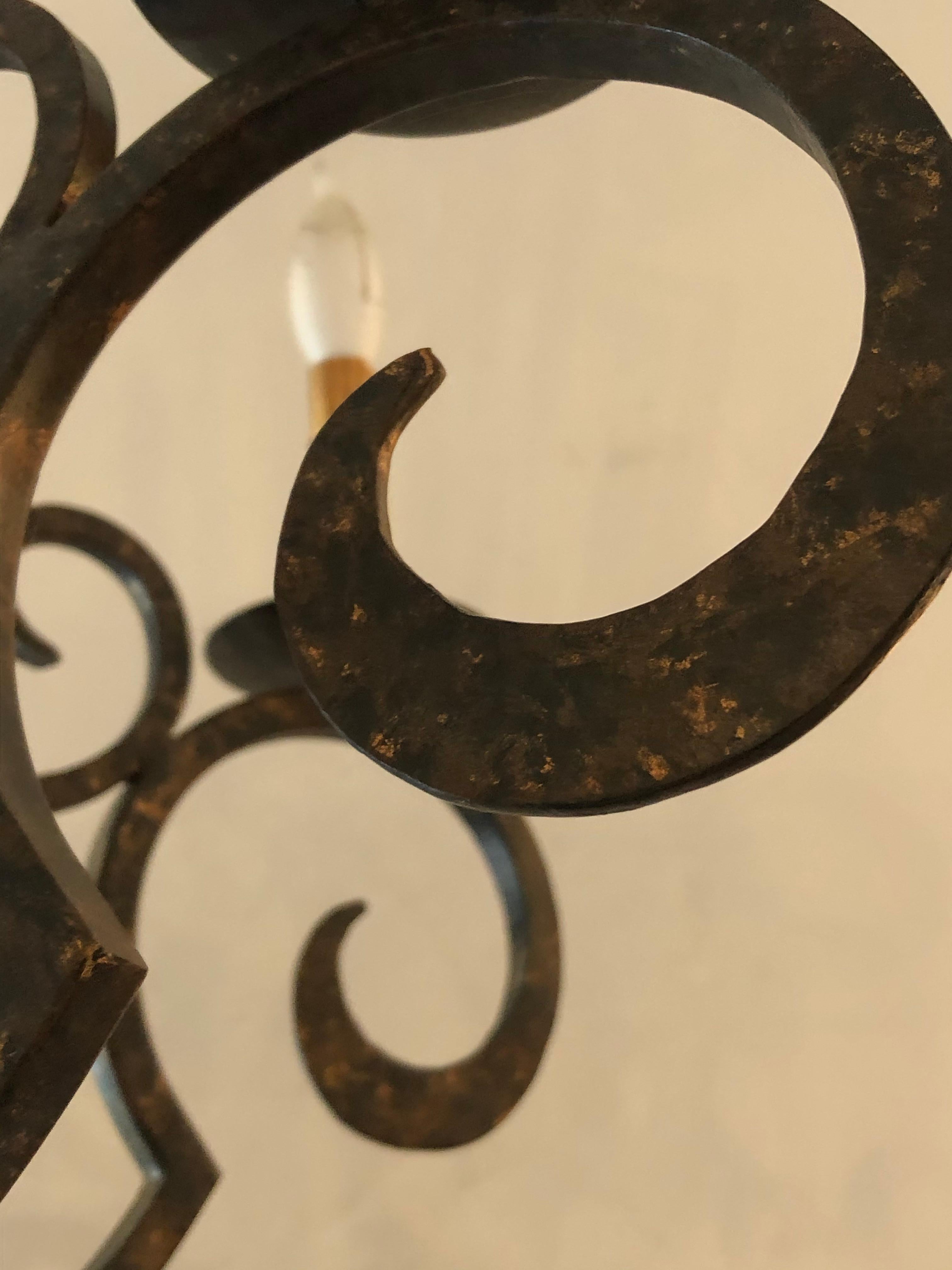Smashing Dark Brown and Gilded Wrought Iron Chandelier In Excellent Condition For Sale In Hopewell, NJ