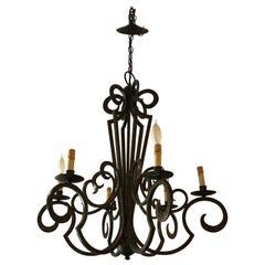 Splendido lampadario in ferro battuto marrone scuro e dorato