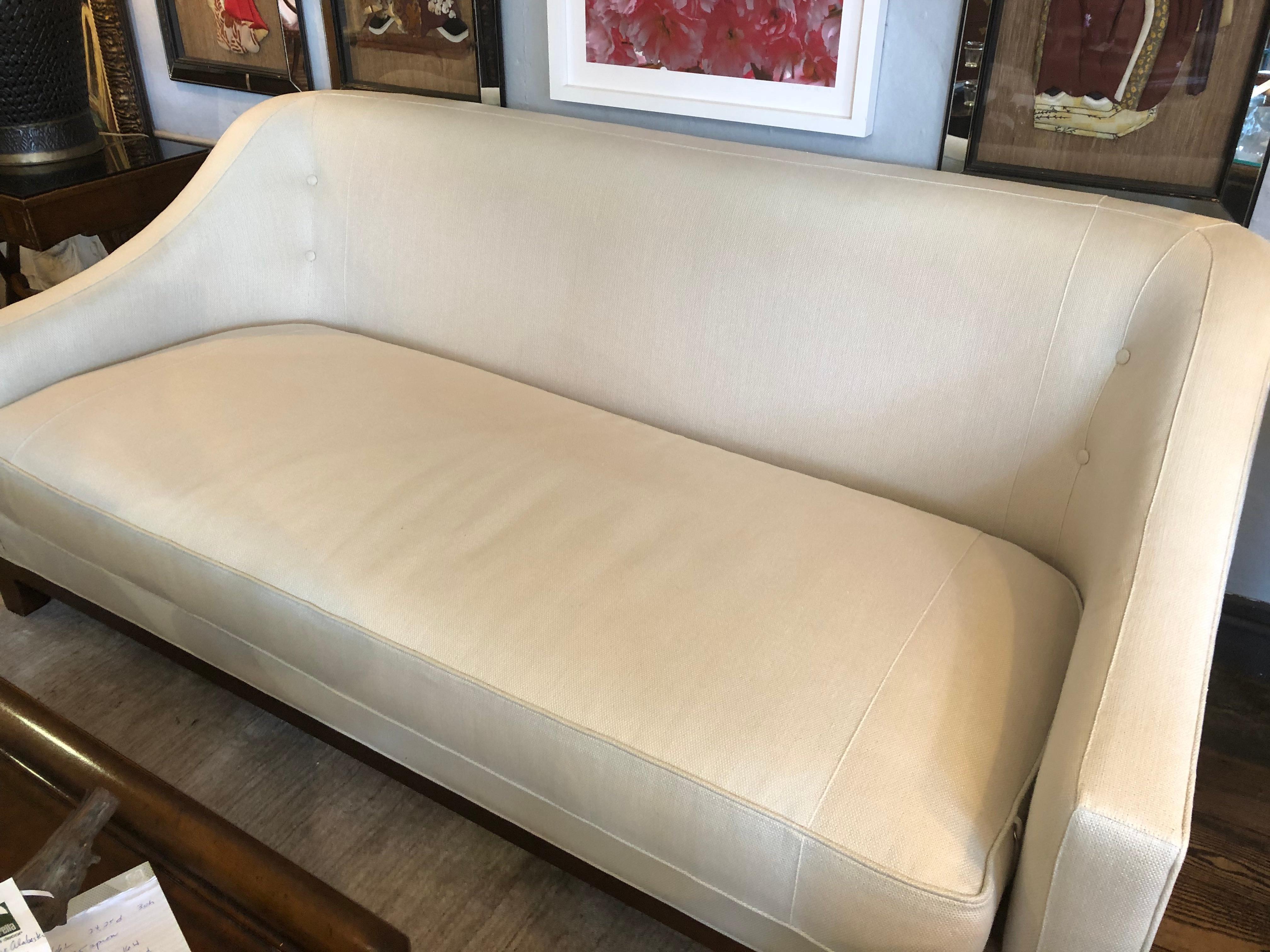 Upholstery Smashing off White Upholstered Sofa by Baker