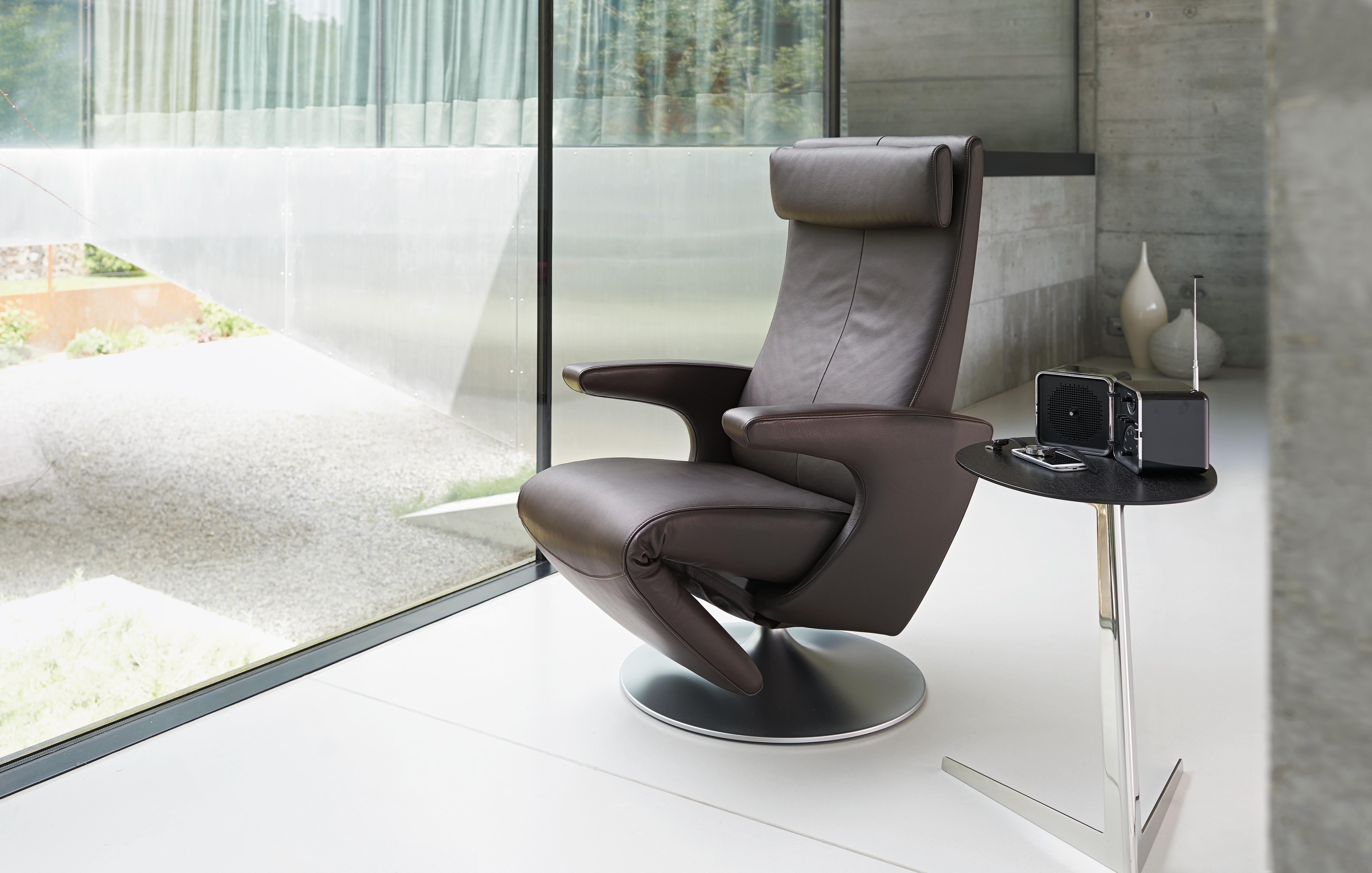Swiss Smile Adjustable Rotating Leather Armchair by FSM For Sale