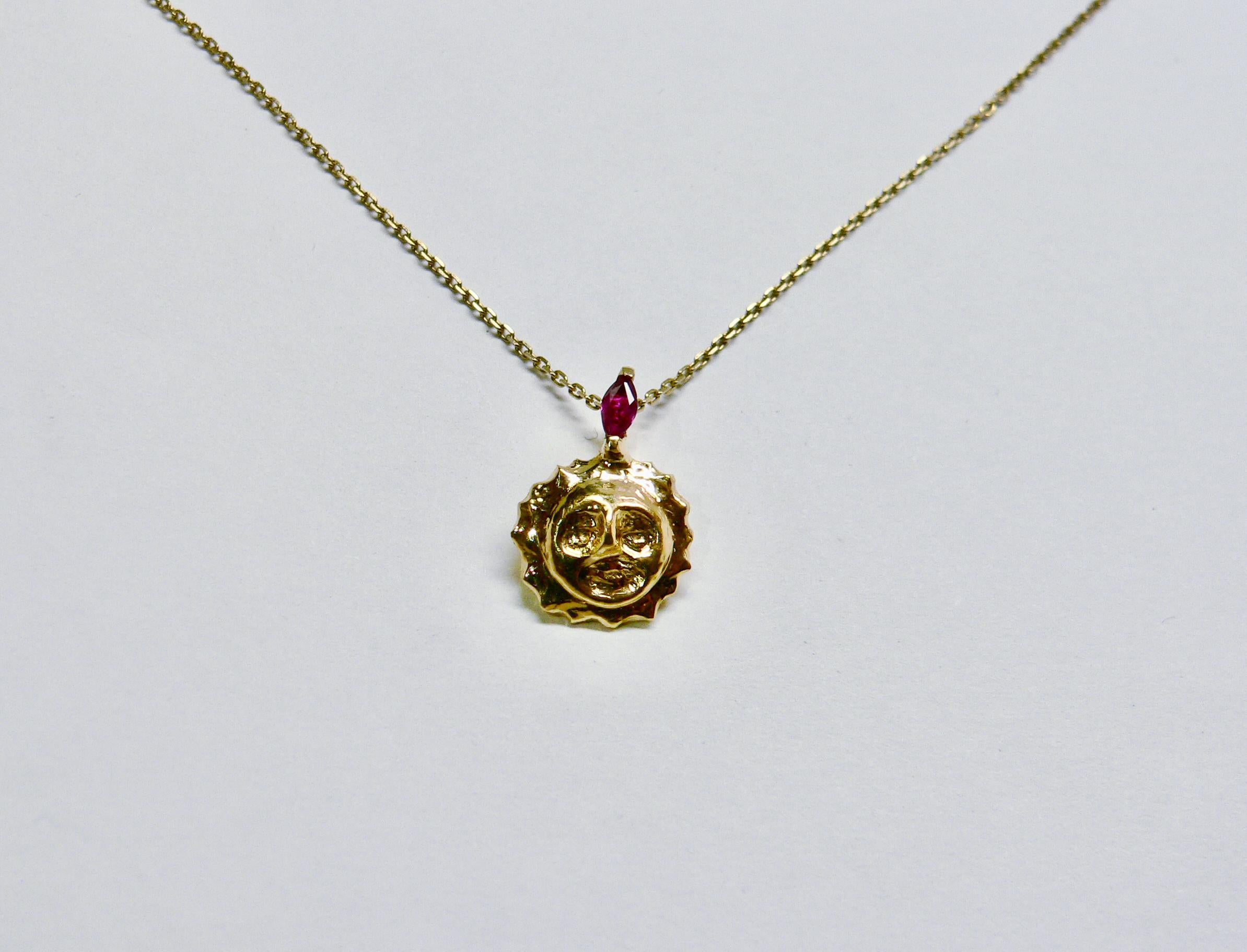 Smiling Sun pendant from Sun and Moon Collection is made of Sterling Silver with 18 Karat gold plated. It is a motif of Sun shining and smiling to us all. And one of its shine is ruby on the top of the sun.

This item is not included chain, 5th and