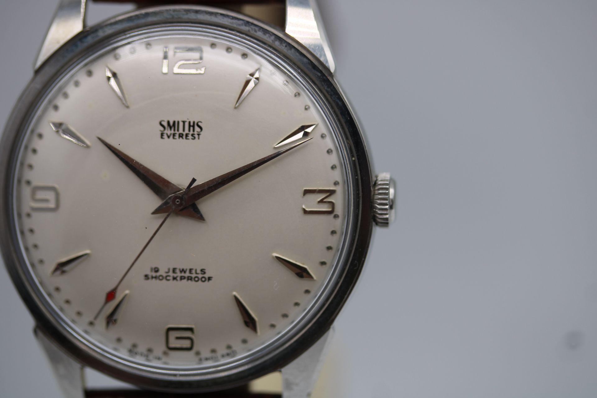 This delightful Smiths Everest is near immaculate in condition and runs exceptionally well for a watch of this age with amplitude at 238 and running at +/- 15 seconds per day. Possibly new old stock and possibly worn just a handful of times.

The